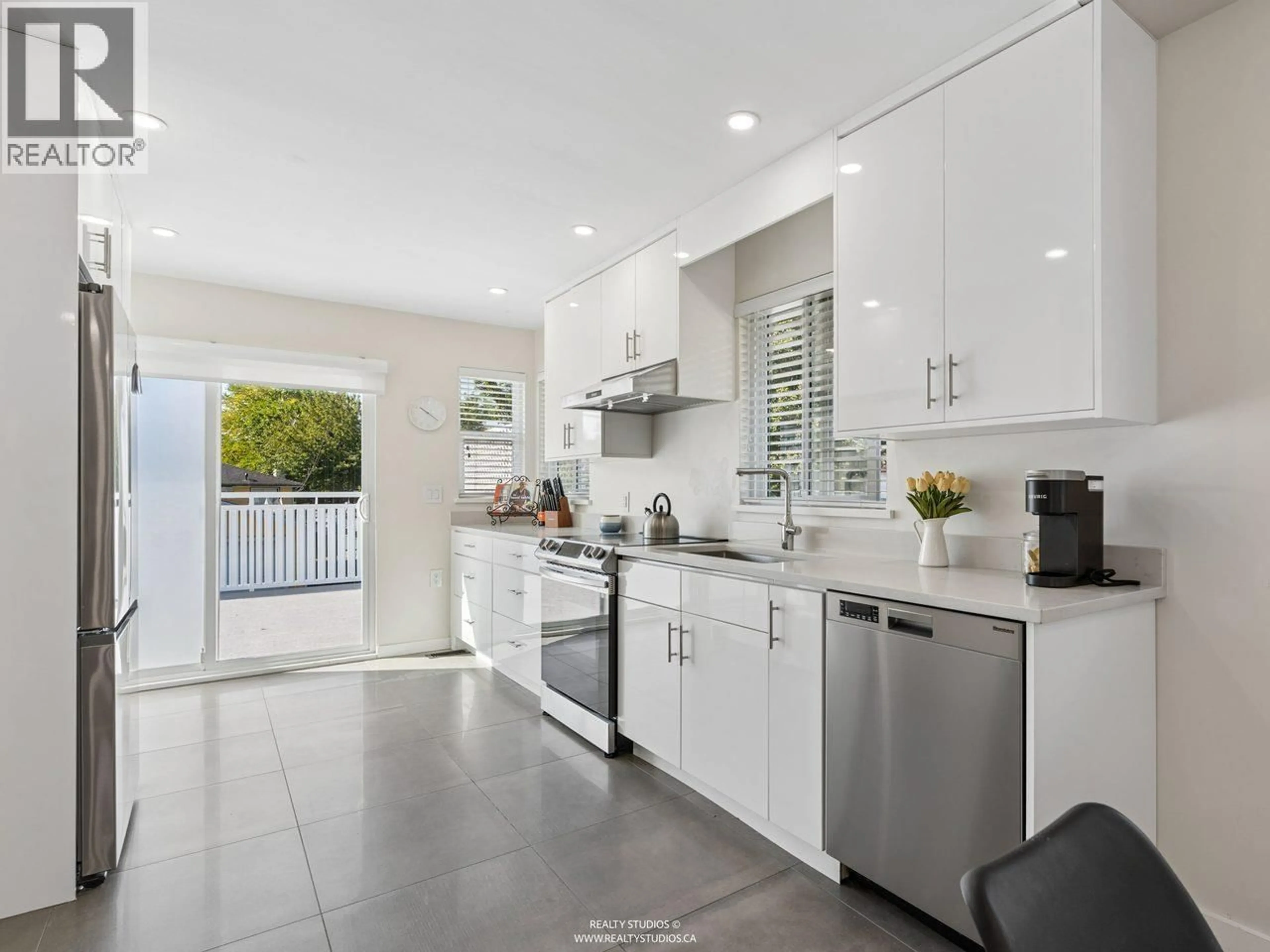 Contemporary kitchen, ceramic/tile floor for 3006 GEORGIA STREET, Vancouver British Columbia V5K2K7