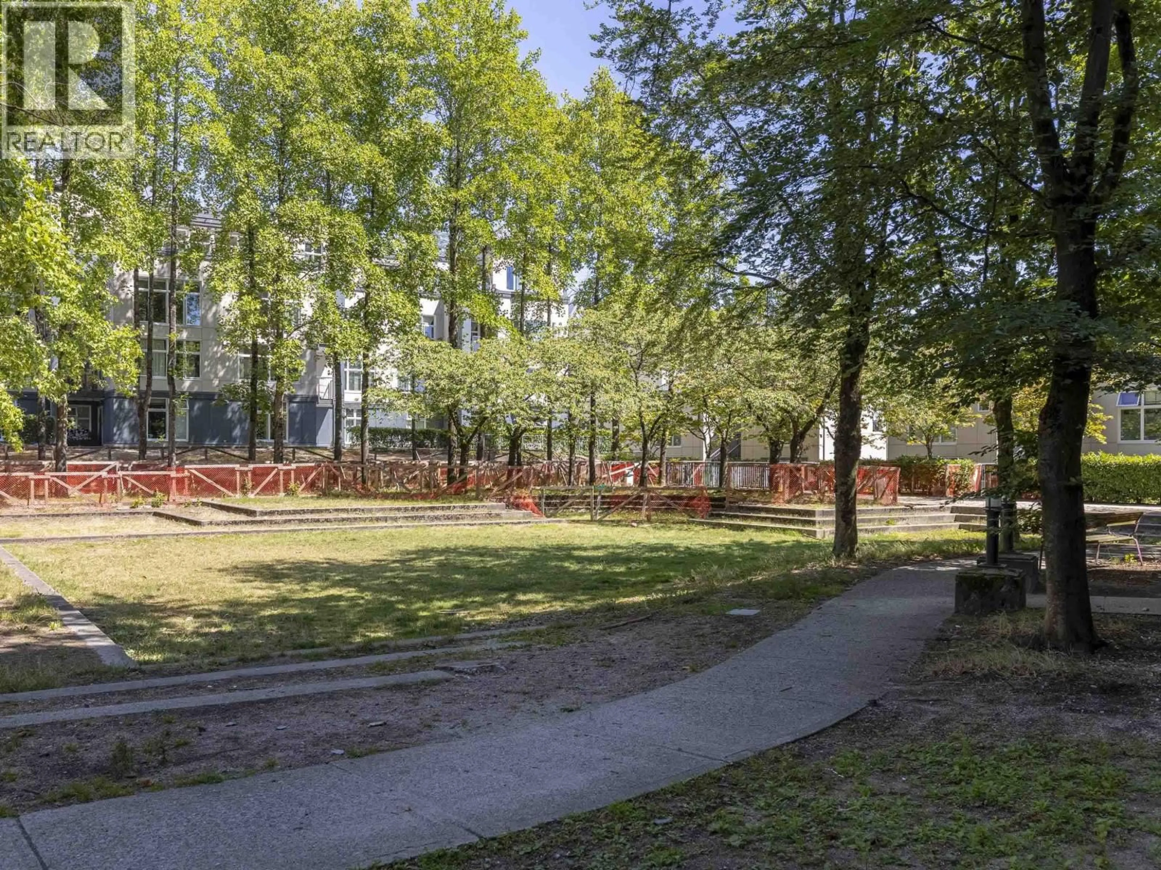 Patio, forest/trees view for 102 - 2528 BROADWAY, Vancouver British Columbia V5M4V2