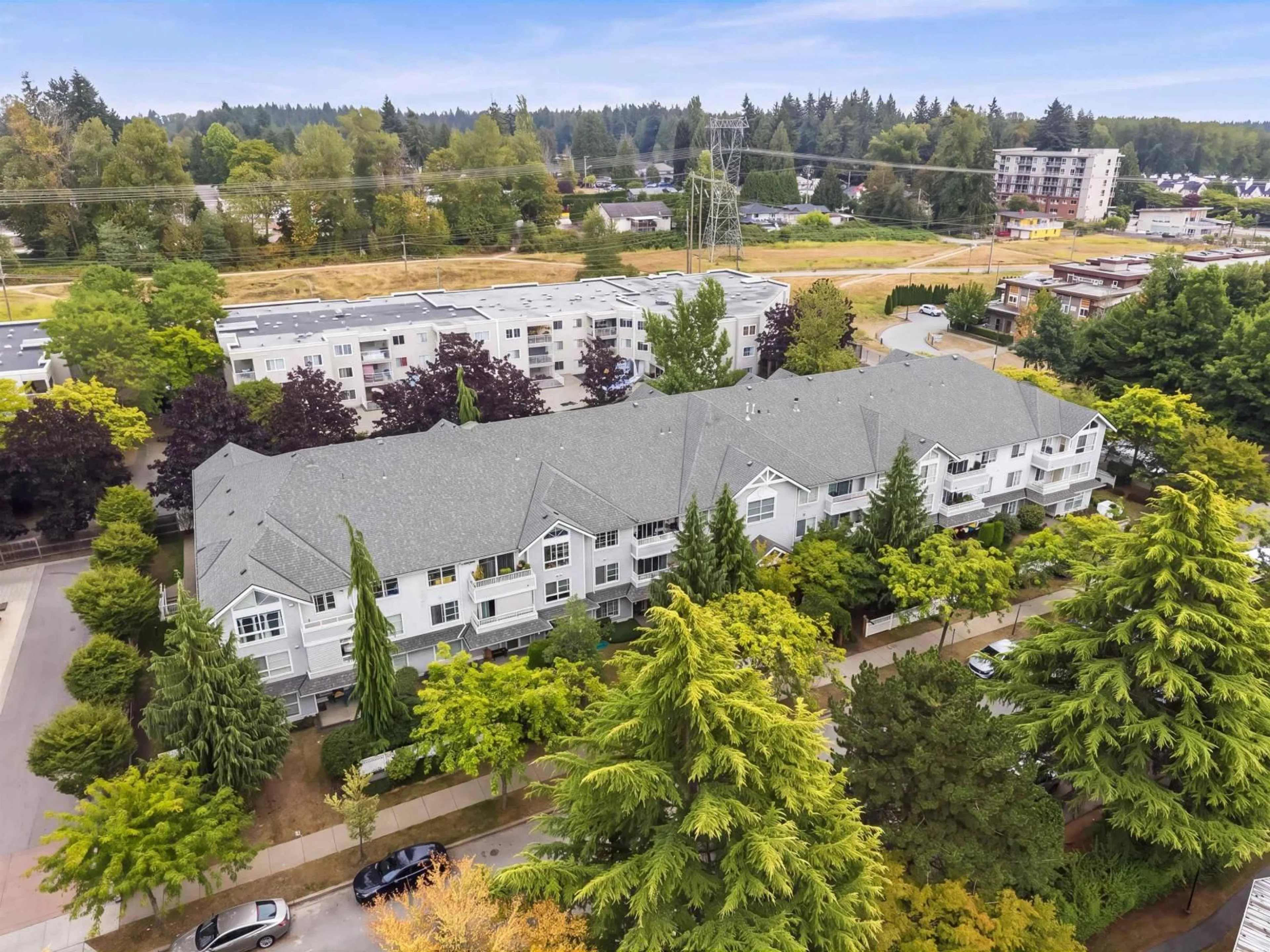A pic from outside/outdoor area/front of a property/back of a property/a pic from drone, unknown for 303 - 10130 139 STREET, Surrey British Columbia V3T4L4