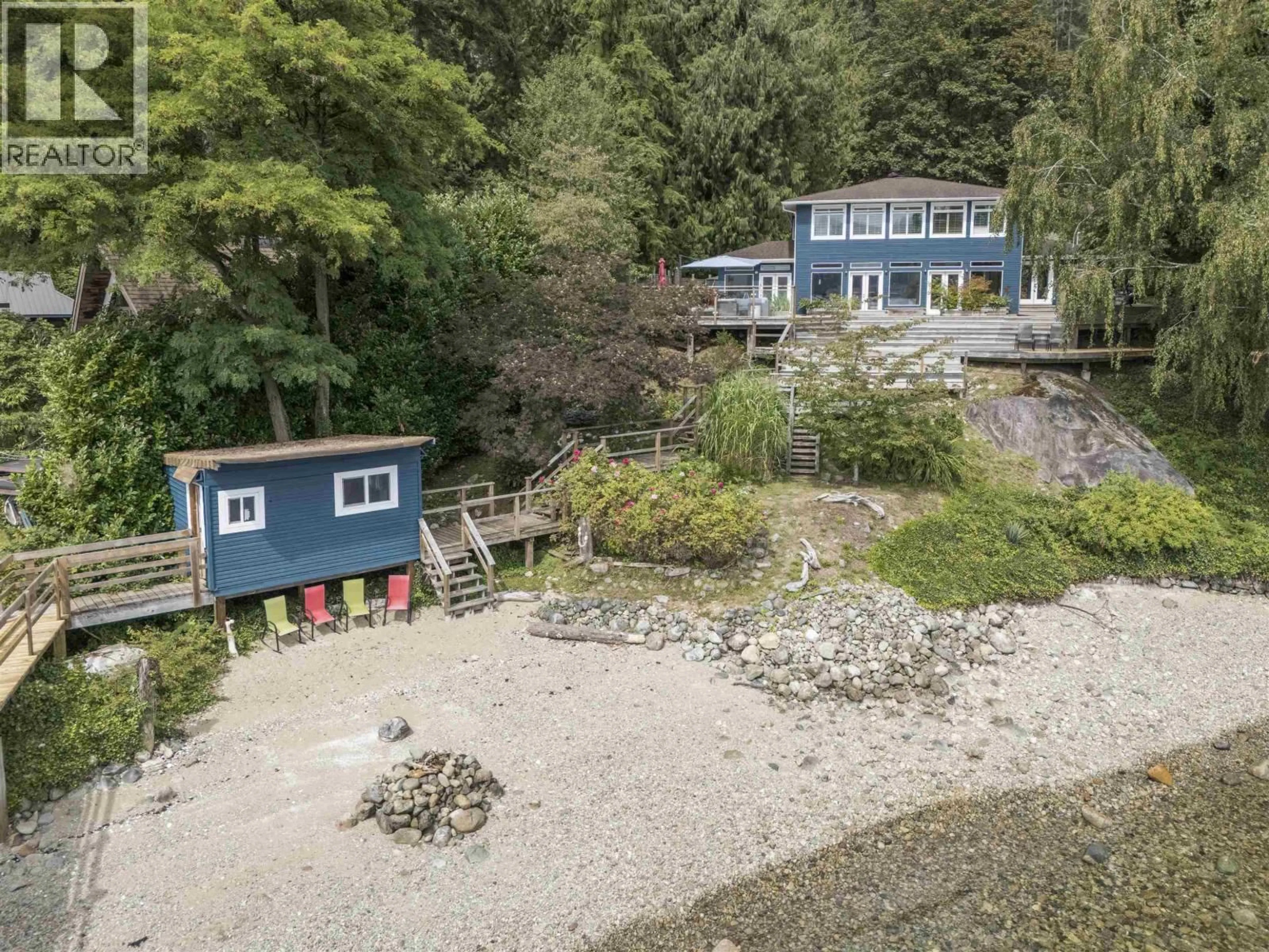 A pic from outside/outdoor area/front of a property/back of a property/a pic from drone, water/lake/river/ocean view for 5439 INDIAN RIVER DRIVE, North Vancouver British Columbia V7G2T7