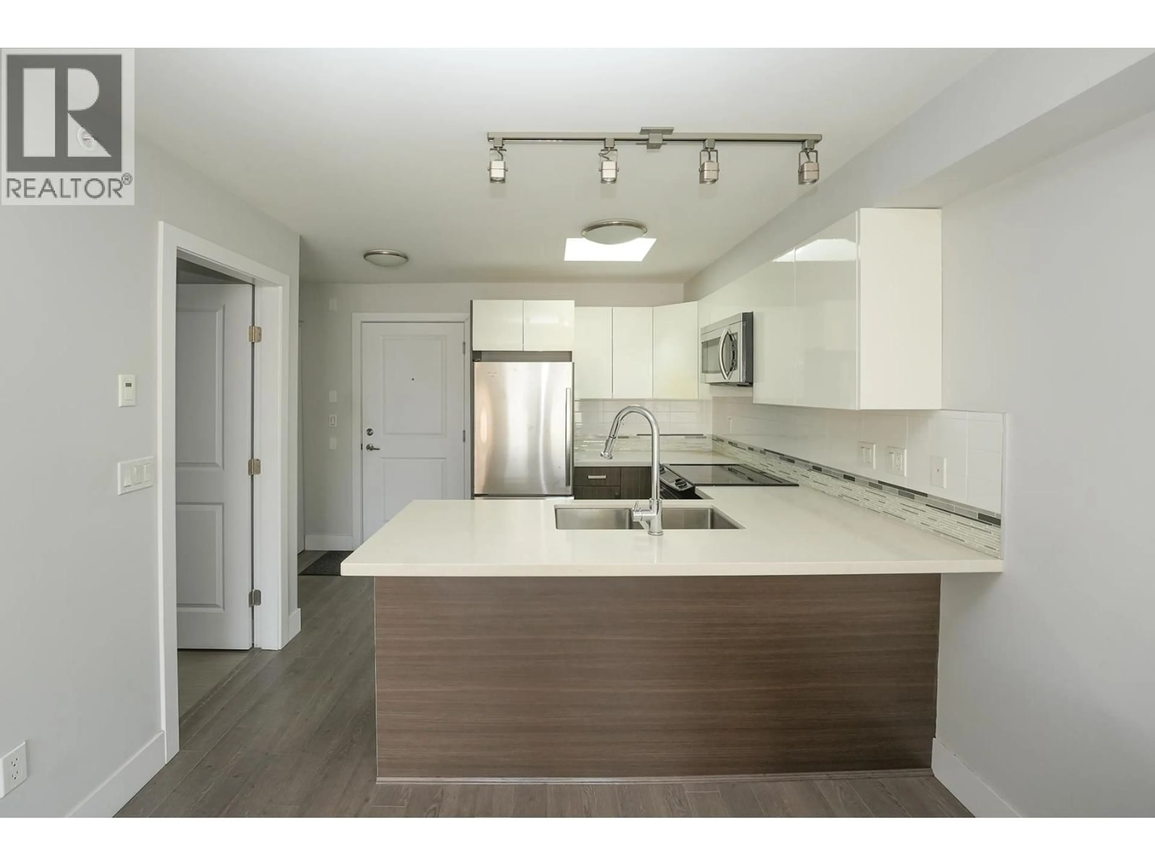 Open concept kitchen, unknown for 403 - 2408 BROADWAY, Vancouver British Columbia V5M4T9