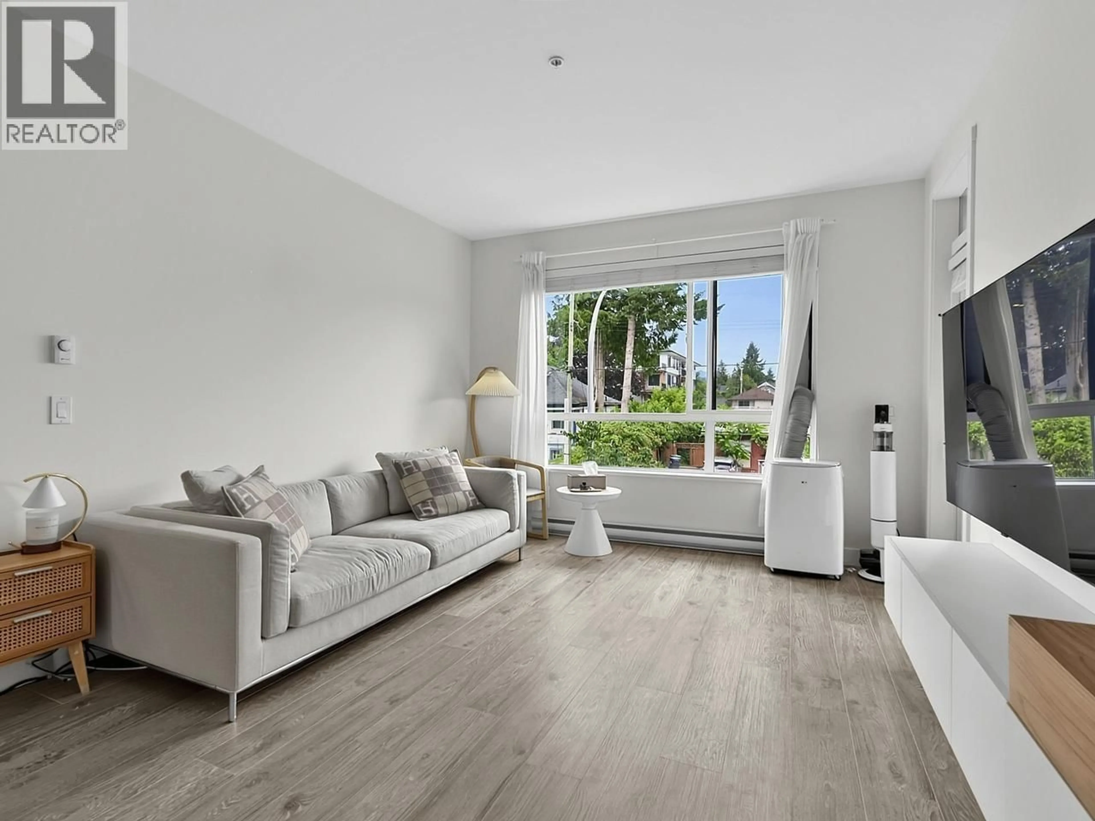 Living room with furniture, unknown for 201 - 2160 GRANT AVENUE, Port Coquitlam British Columbia V3B0T3