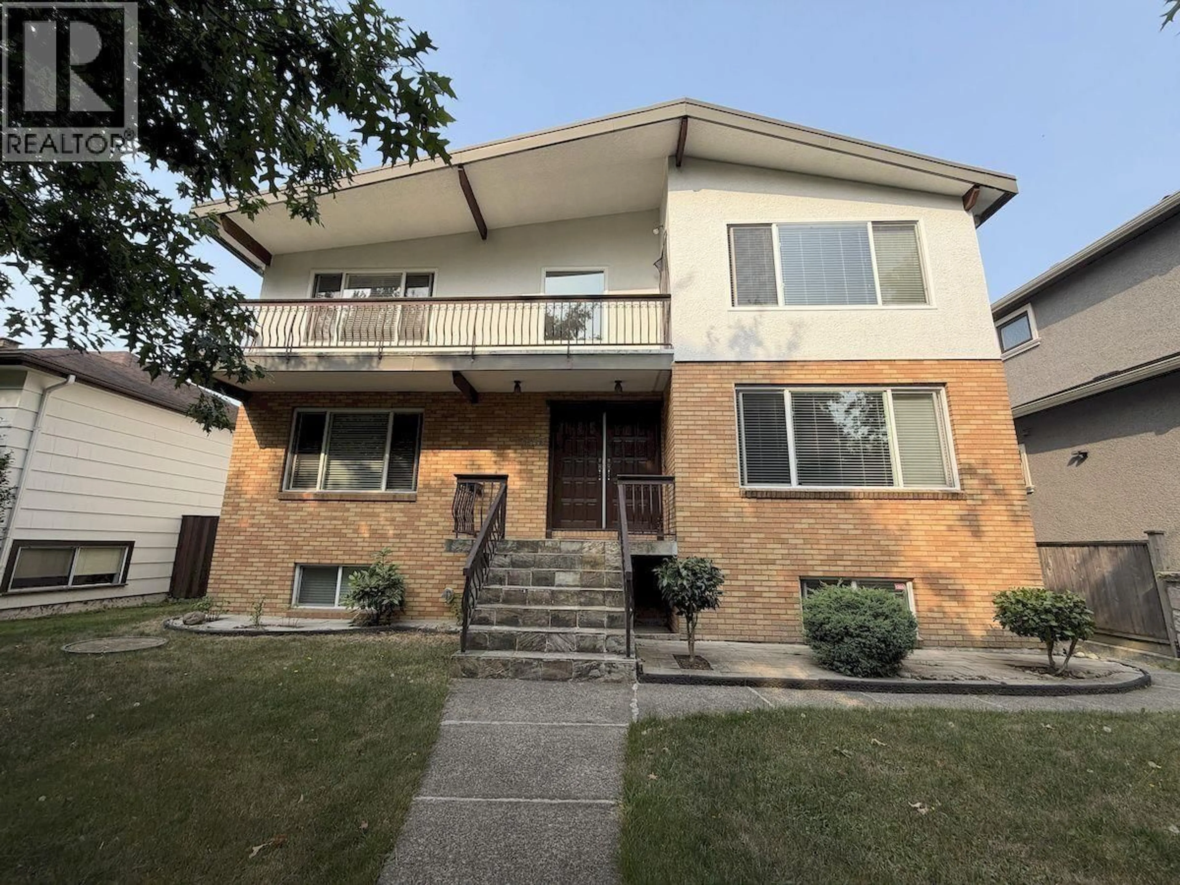 Home with brick exterior material, street for 5885 LINCOLN STREET, Vancouver British Columbia V5R4P8