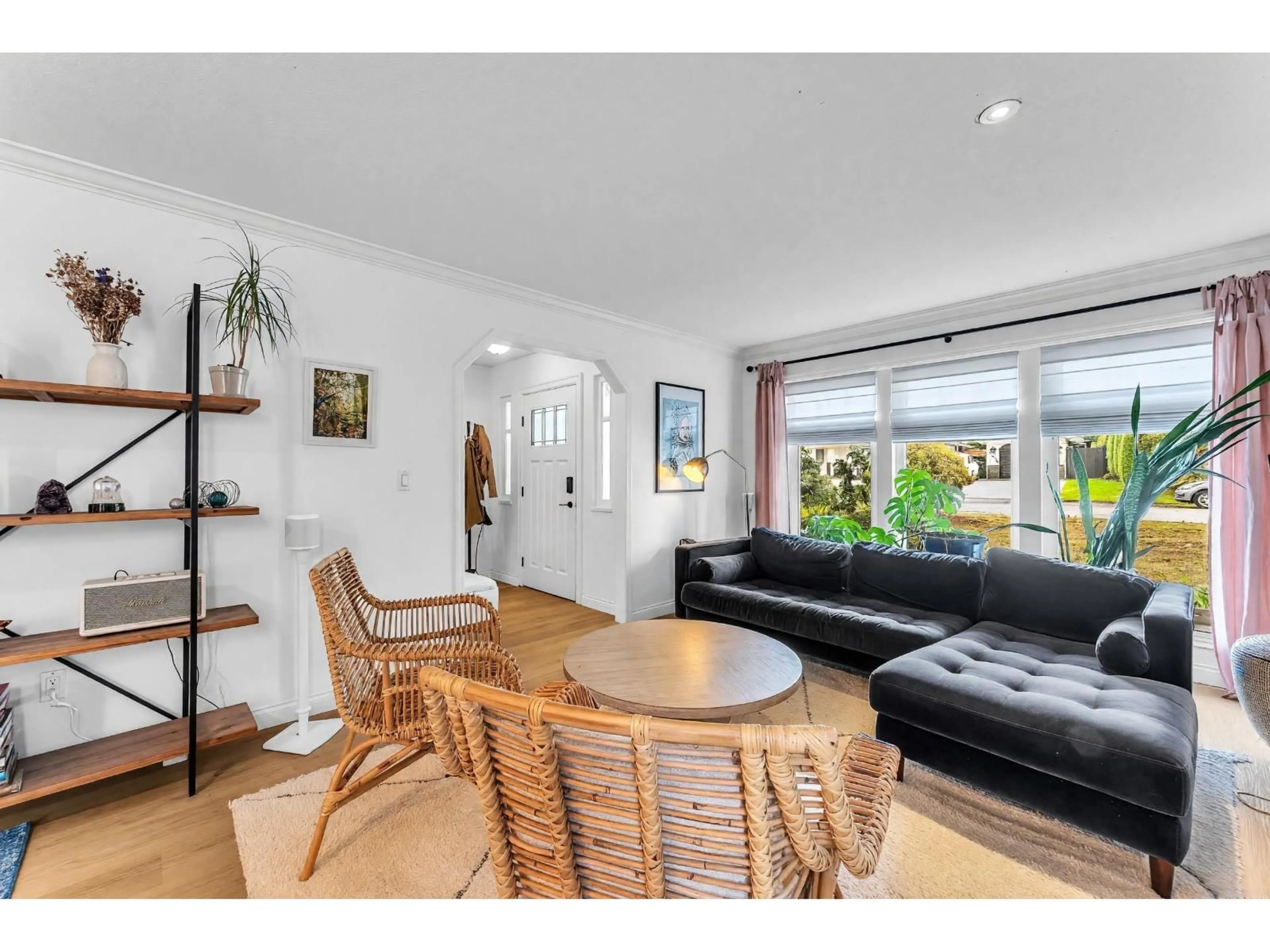 Living room with furniture, wood/laminate floor for 9457 215A STREET, Langley British Columbia V1M2A5
