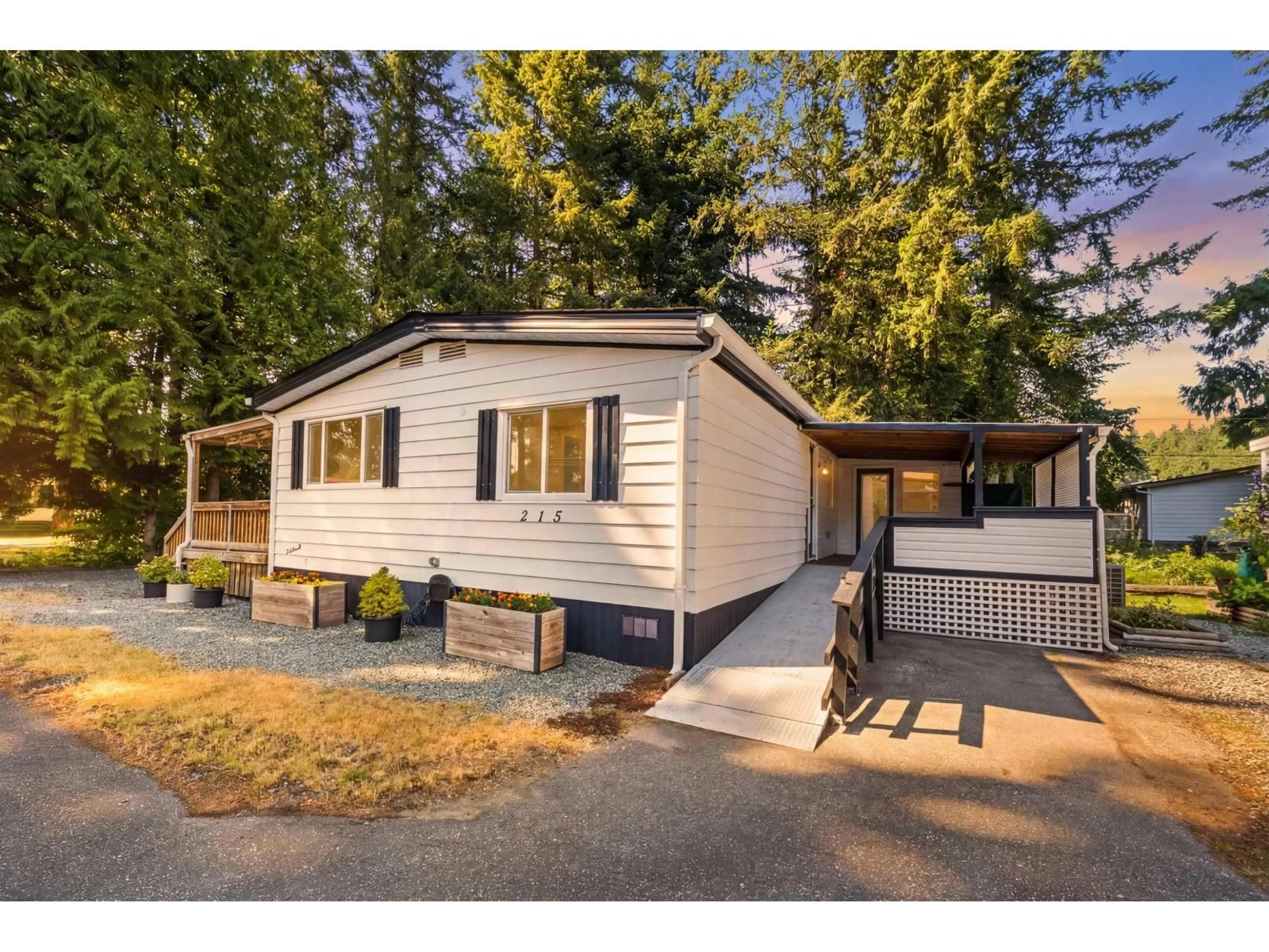 Home with vinyl exterior material, street for 215 - 20071 24 AVENUE, Langley British Columbia V2Z2A1