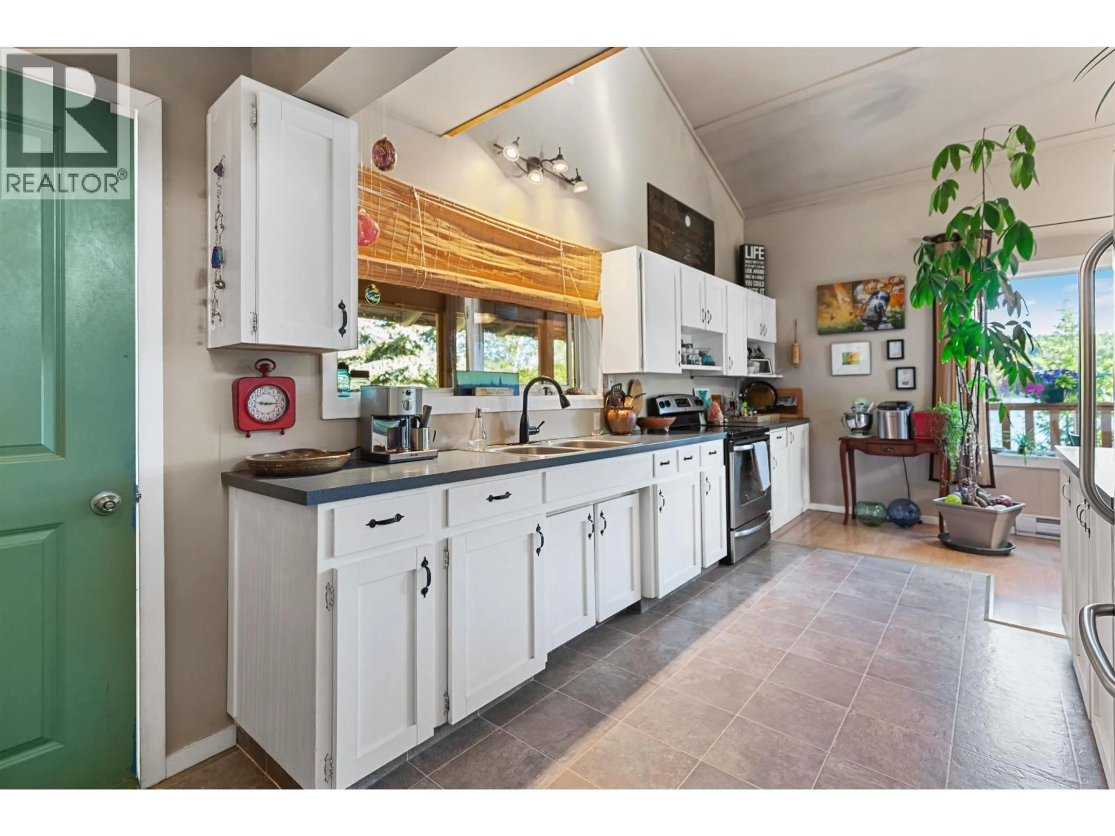 Open concept kitchen, ceramic/tile floor for 40150 BEDNESTI LAKE ROAD, Prince George British Columbia V2N6P4