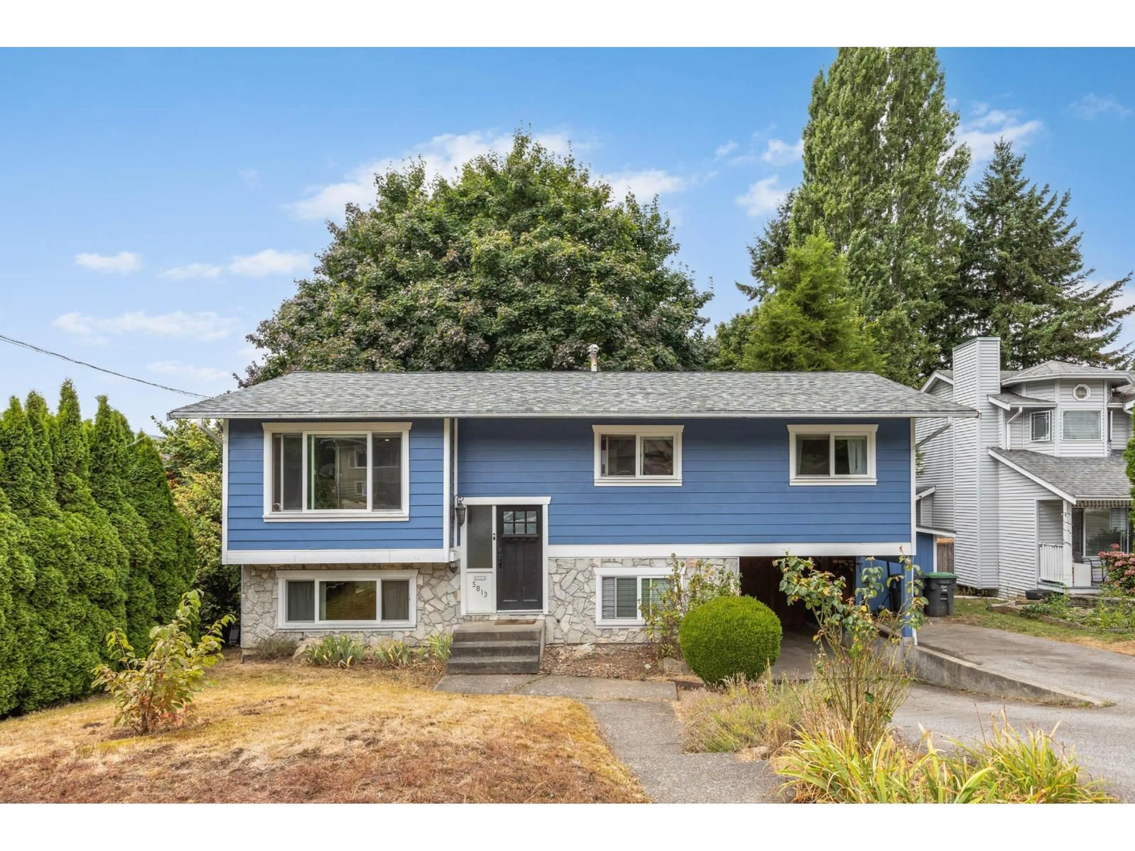 Home with vinyl exterior material, street for 5813 180 STREET, Surrey British Columbia V3S4L2
