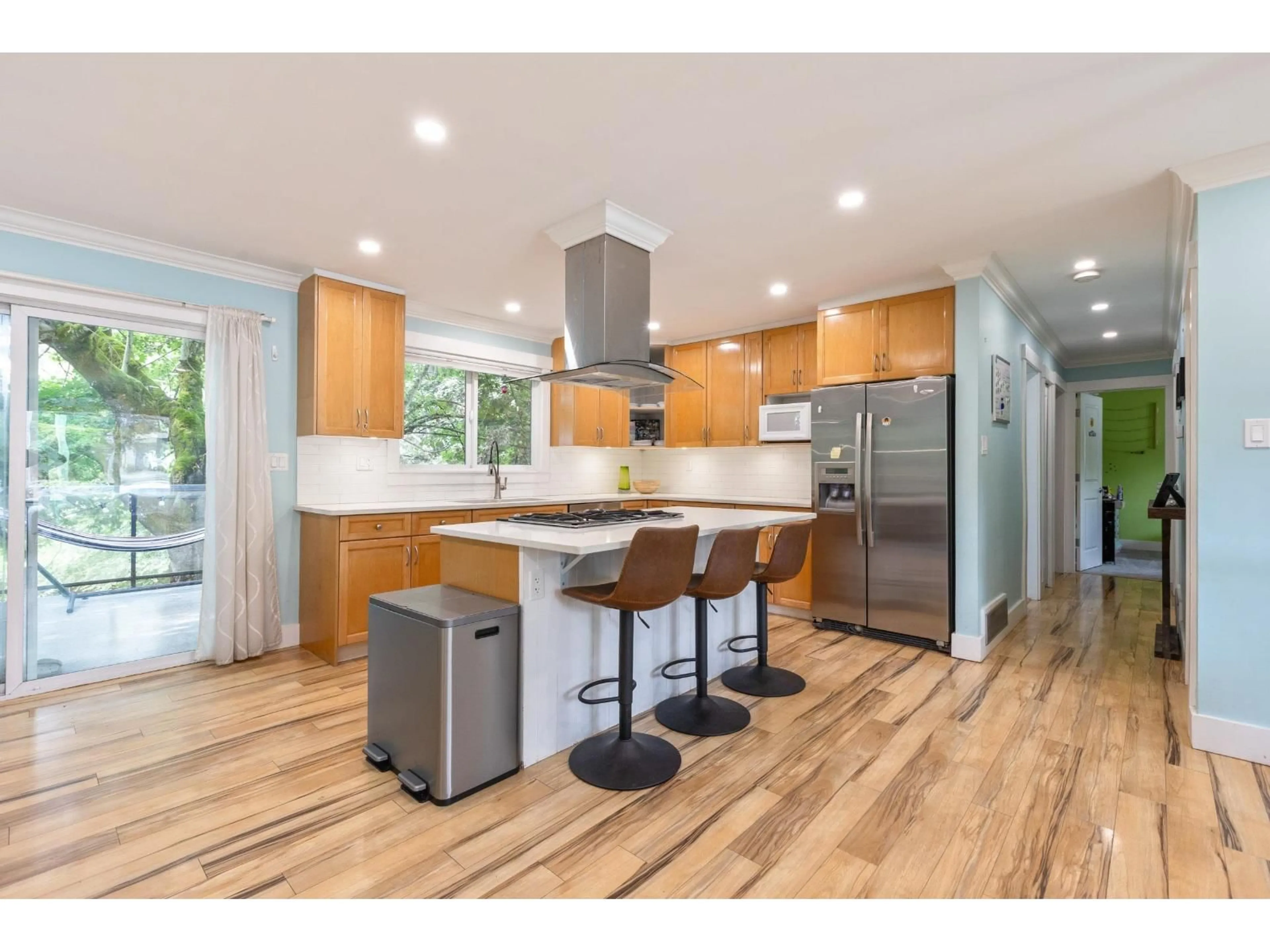 Open concept kitchen, wood/laminate floor for 5813 180 STREET, Surrey British Columbia V3S4L2