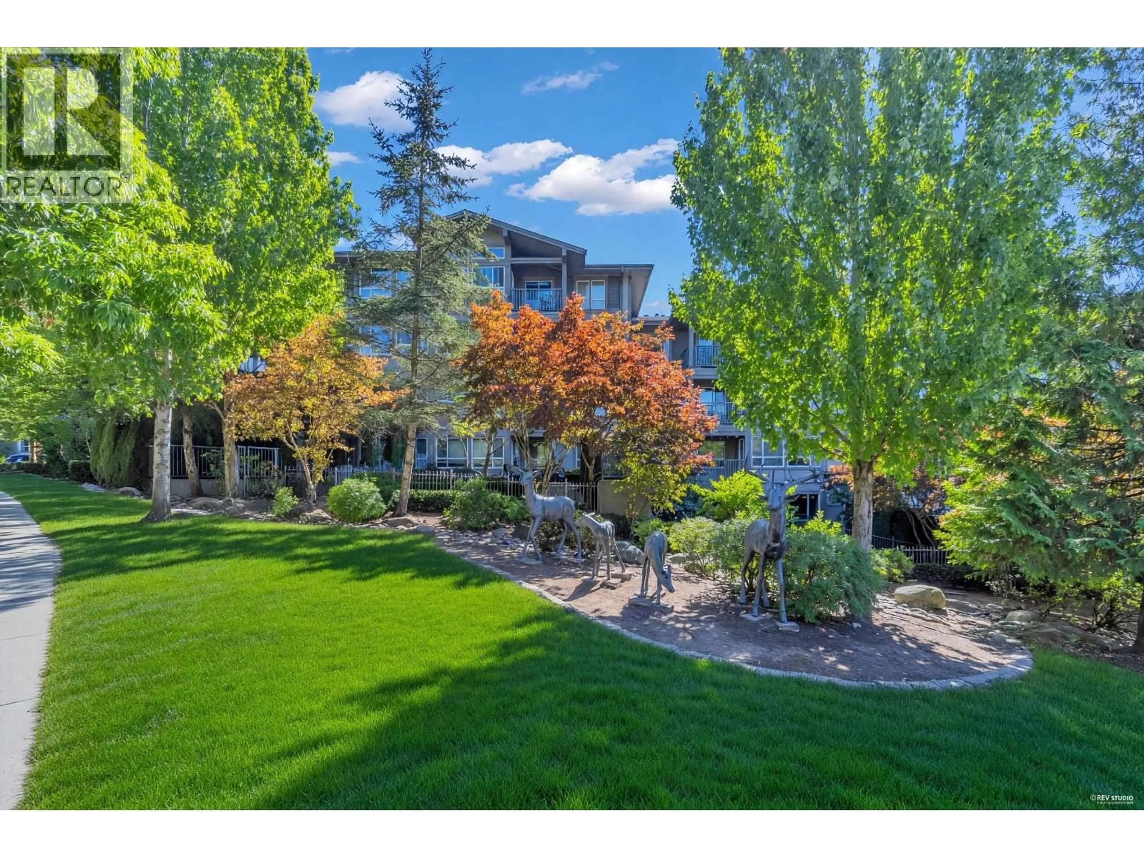 A pic from outside/outdoor area/front of a property/back of a property/a pic from drone, mountain view for 318 - 3110 DAVANEE SPRINGS BOULEVARD, Coquitlam British Columbia V3E0B4