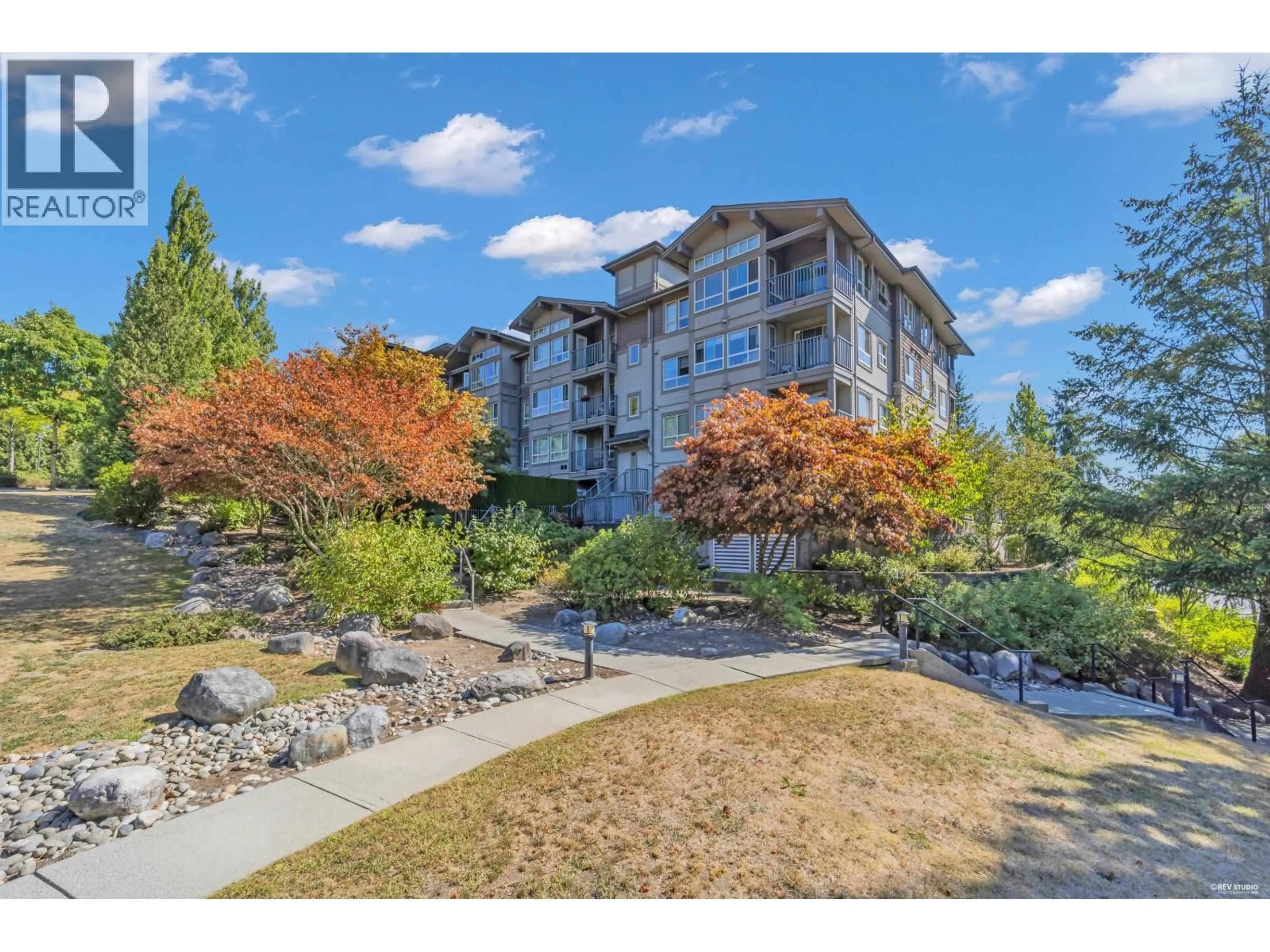 A pic from outside/outdoor area/front of a property/back of a property/a pic from drone, unknown for 318 - 3110 DAVANEE SPRINGS BOULEVARD, Coquitlam British Columbia V3E0B4