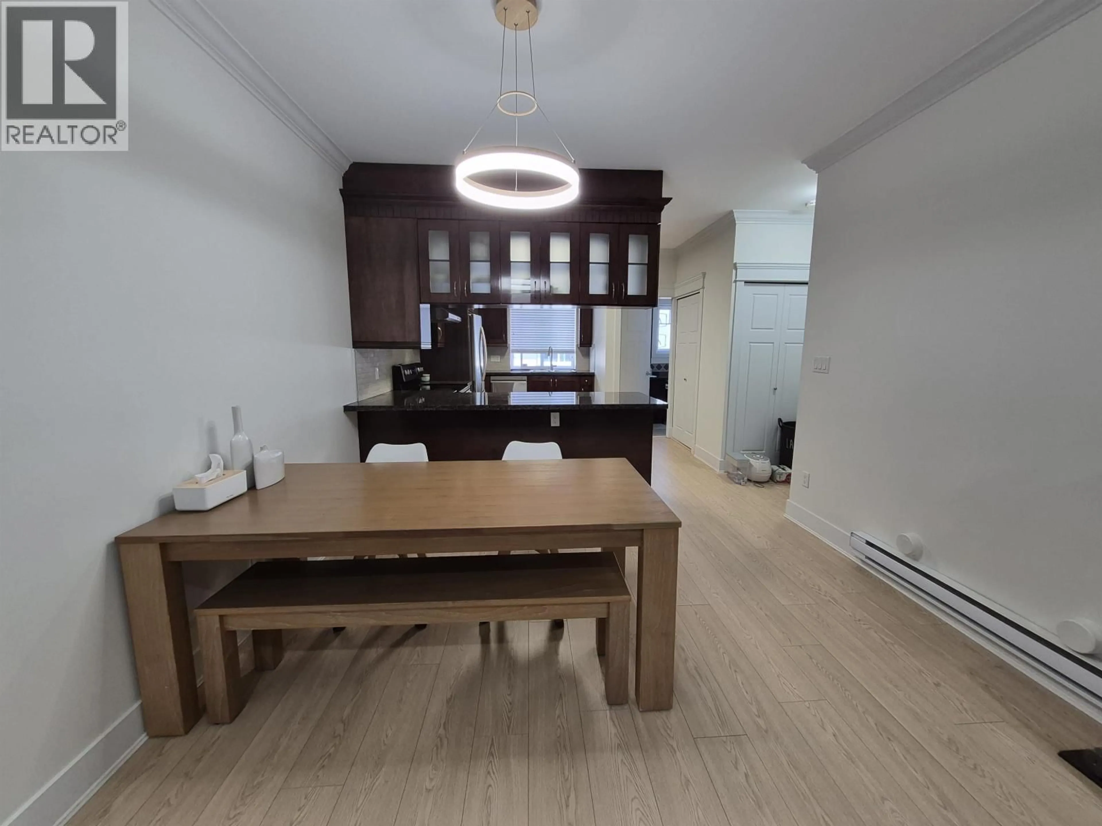 Dining room, wood/laminate floor for 112 - 3333 DEWDNEY TRUNK ROAD, Port Moody British Columbia V3H2E4
