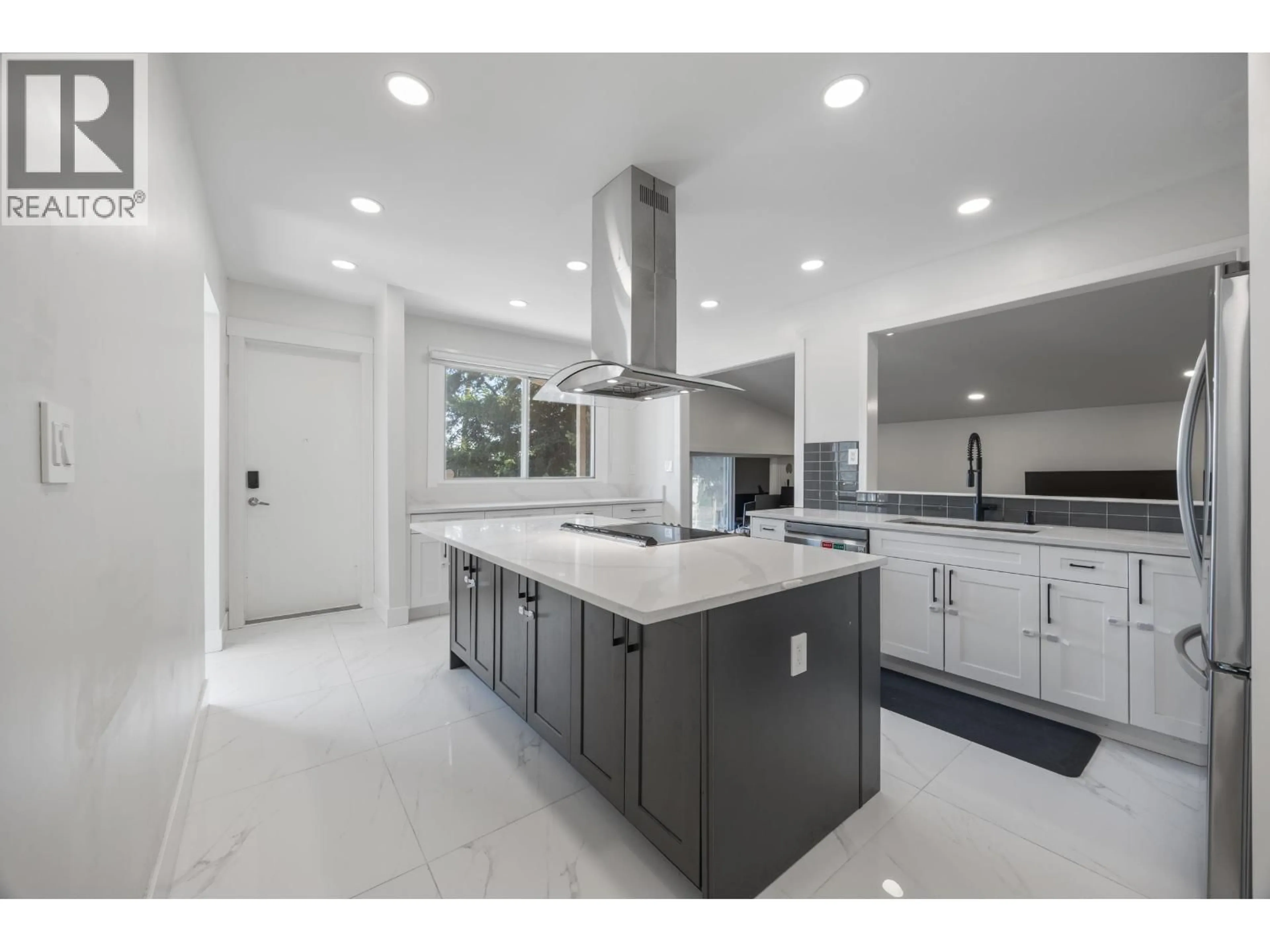 Open concept kitchen, ceramic/tile floor for 8085 10TH AVENUE, Burnaby British Columbia V3N2S4