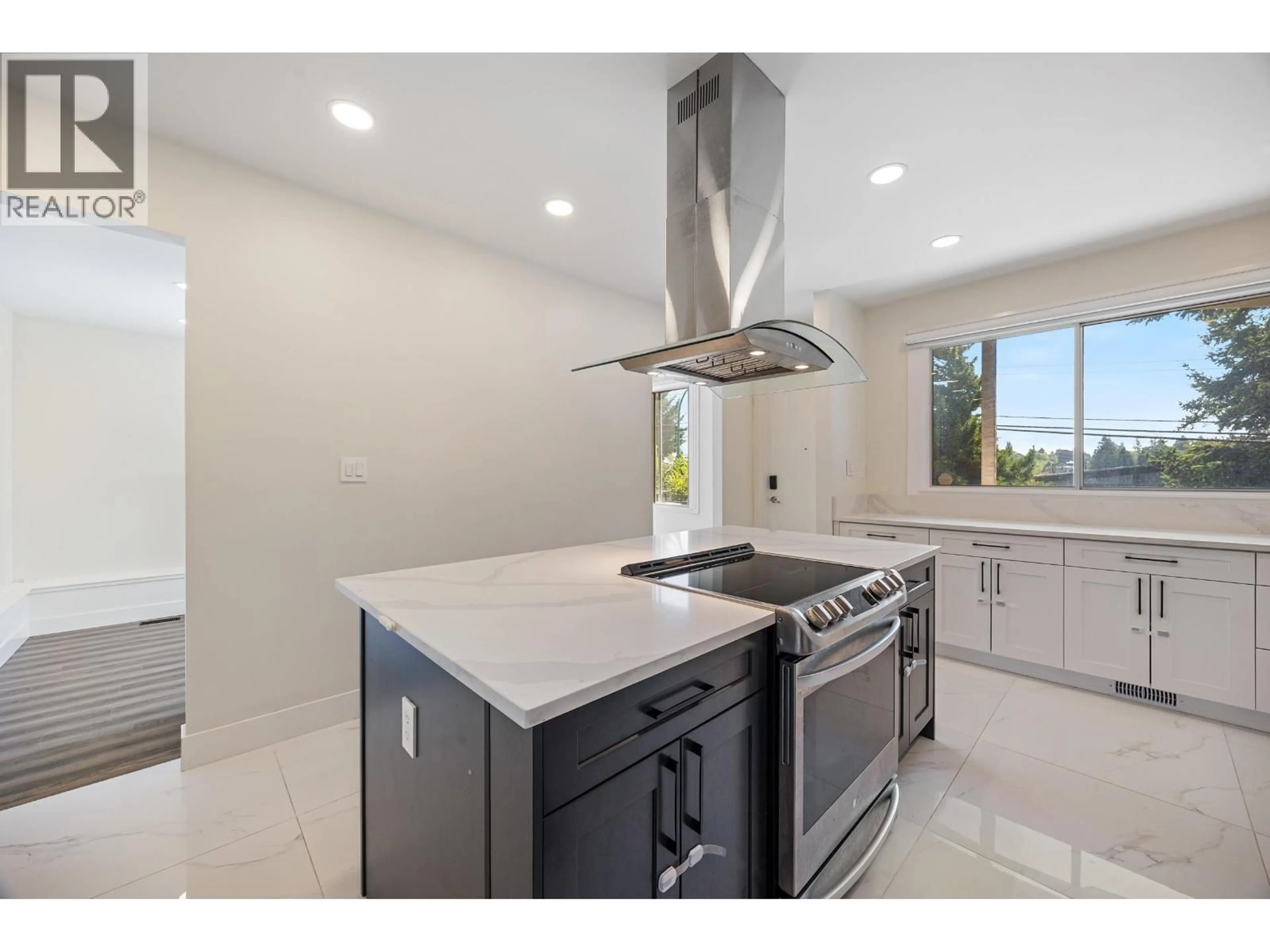 Open concept kitchen, ceramic/tile floor for 8085 10TH AVENUE, Burnaby British Columbia V3N2S4