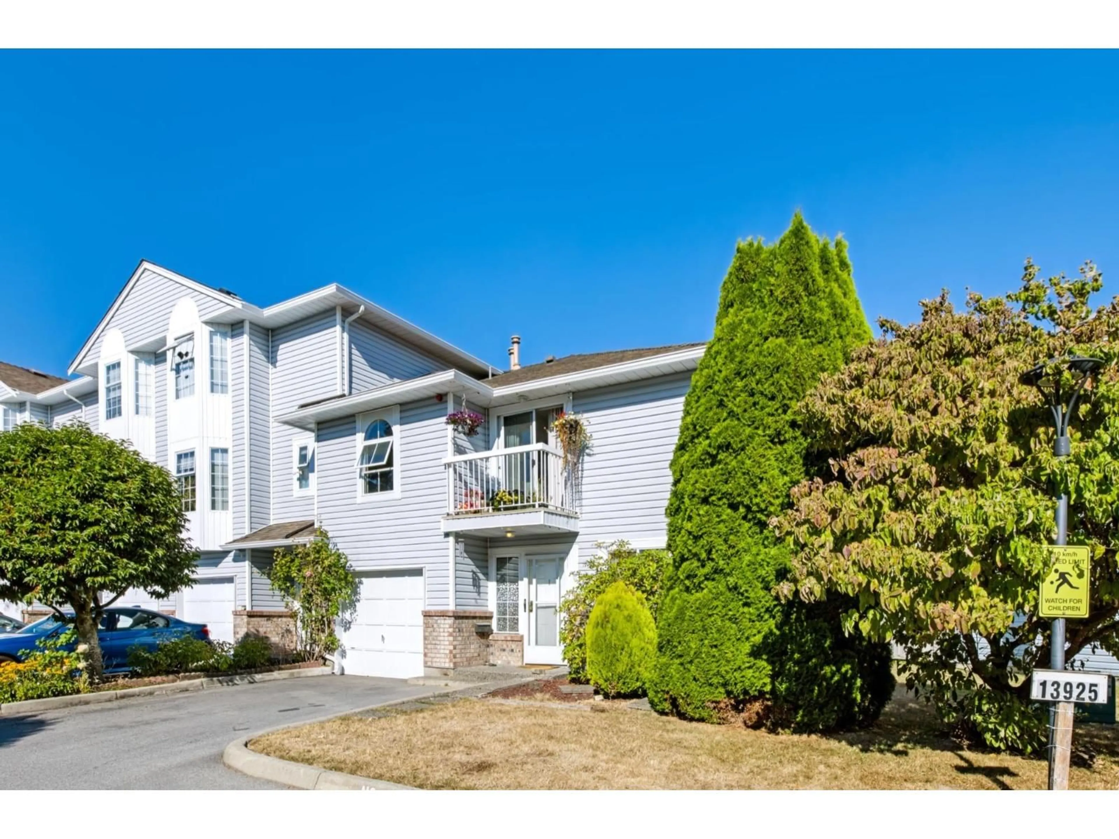 Home with vinyl exterior material, street for 1 - 13925 70 AVENUE, Surrey British Columbia V3W0A2