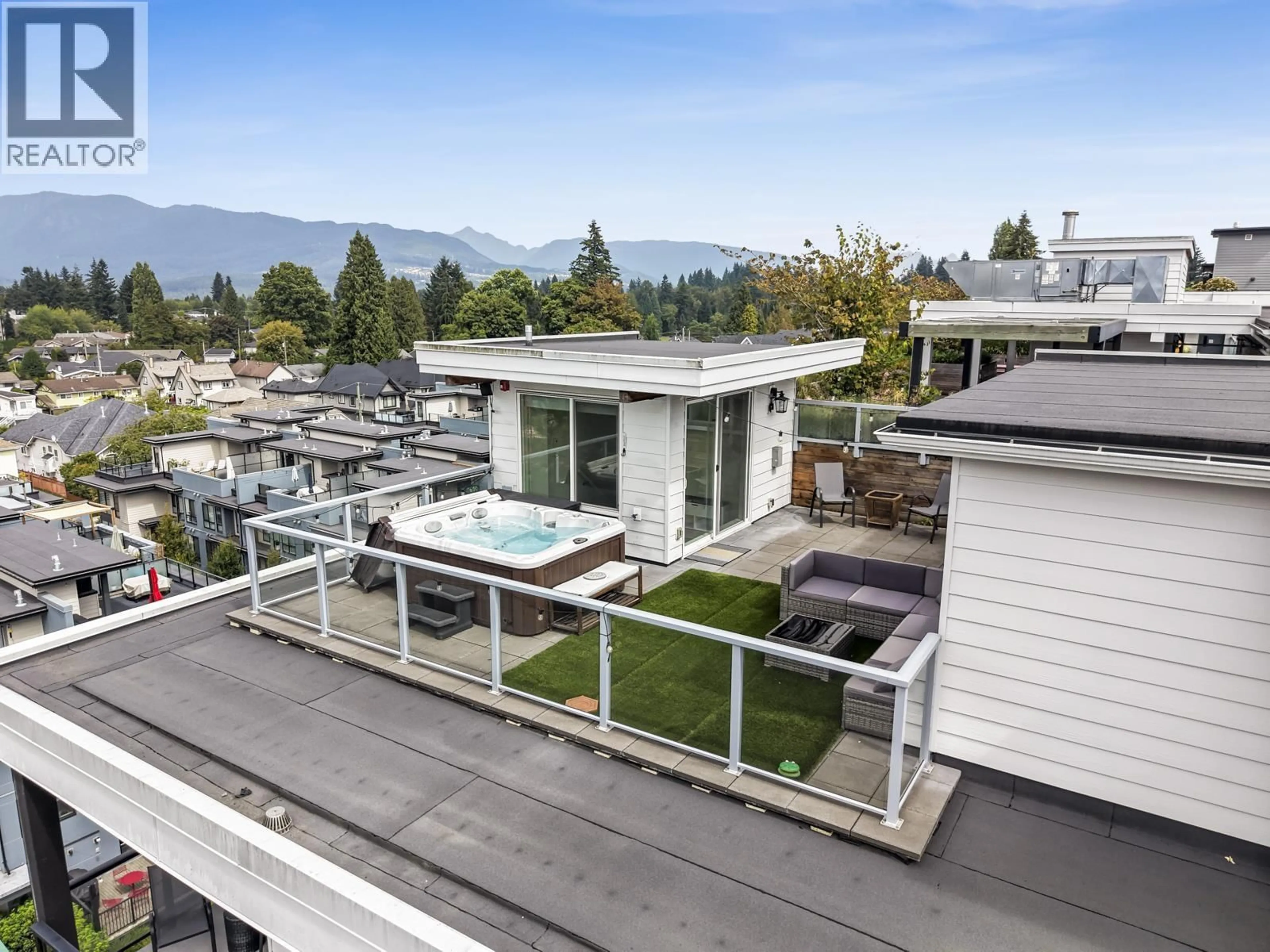 A pic from outside/outdoor area/front of a property/back of a property/a pic from drone, mountain view for 611 - 707 COMO LAKE AVENUE, Coquitlam British Columbia V3J0J5