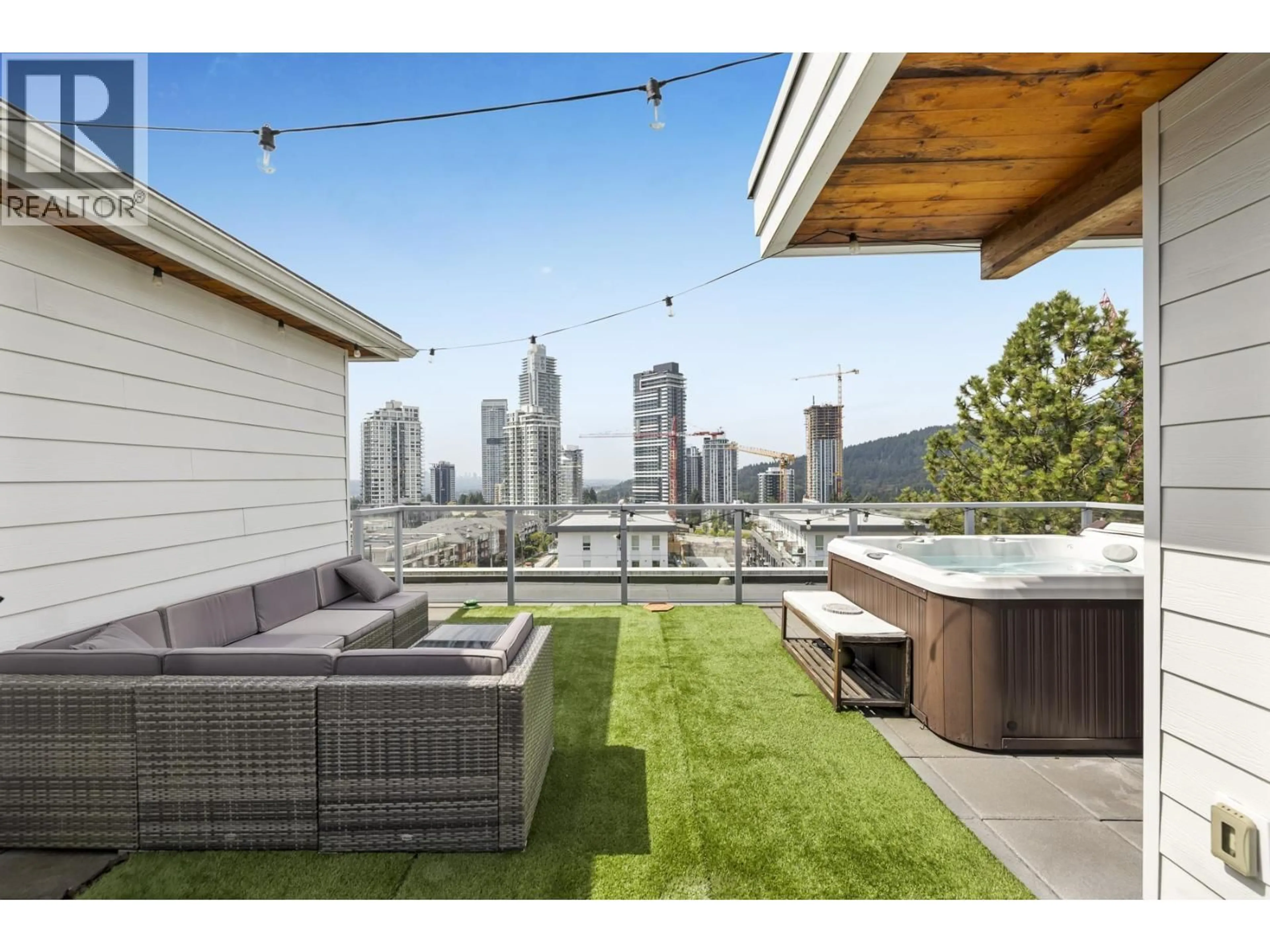 Patio, city buildings view from balcony for 611 - 707 COMO LAKE AVENUE, Coquitlam British Columbia V3J0J5