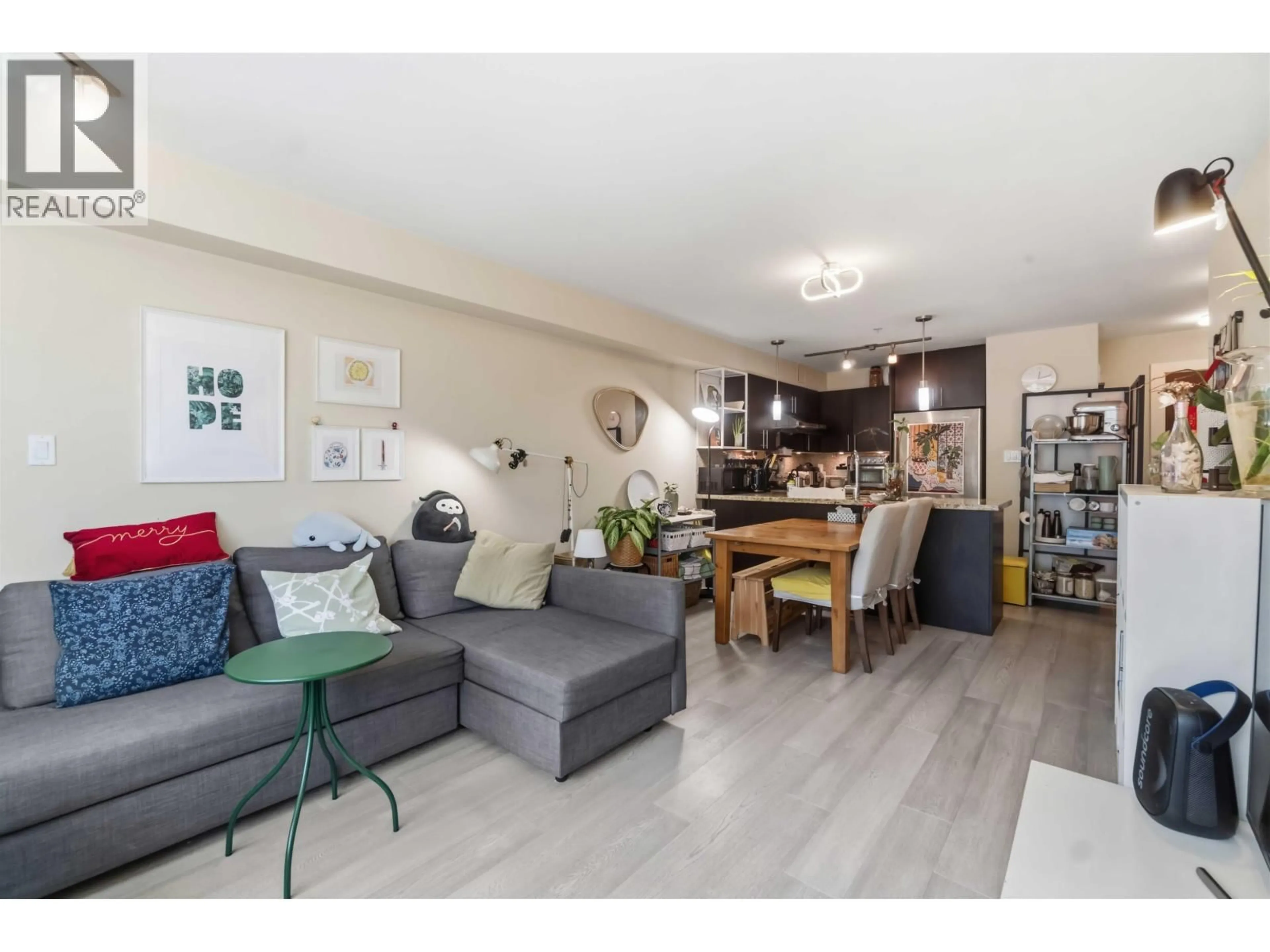 Living room with furniture, wood/laminate floor for 202 - 3611 18TH AVENUE, Vancouver British Columbia V6S1B3