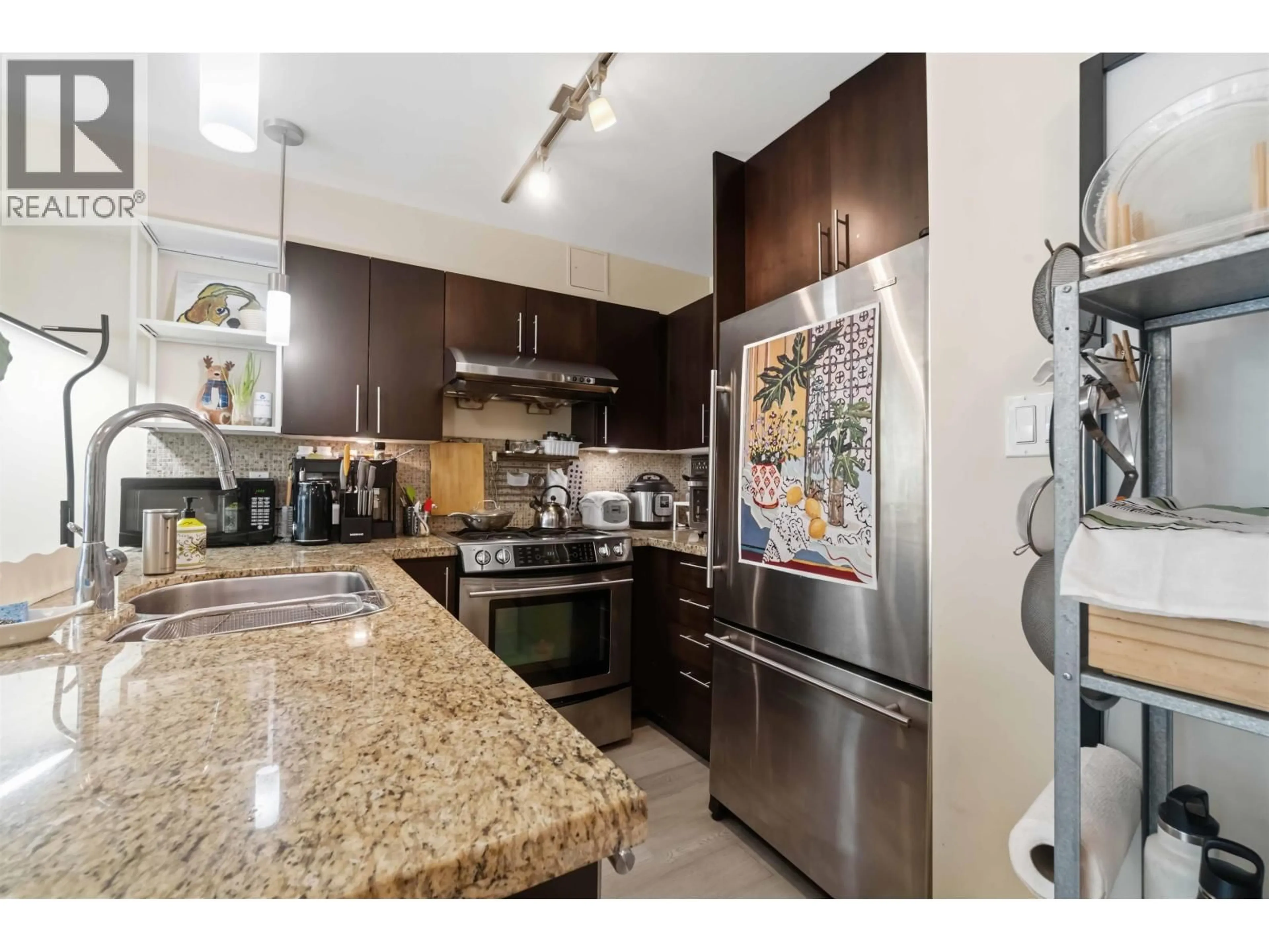 Open concept kitchen, ceramic/tile floor for 202 - 3611 18TH AVENUE, Vancouver British Columbia V6S1B3