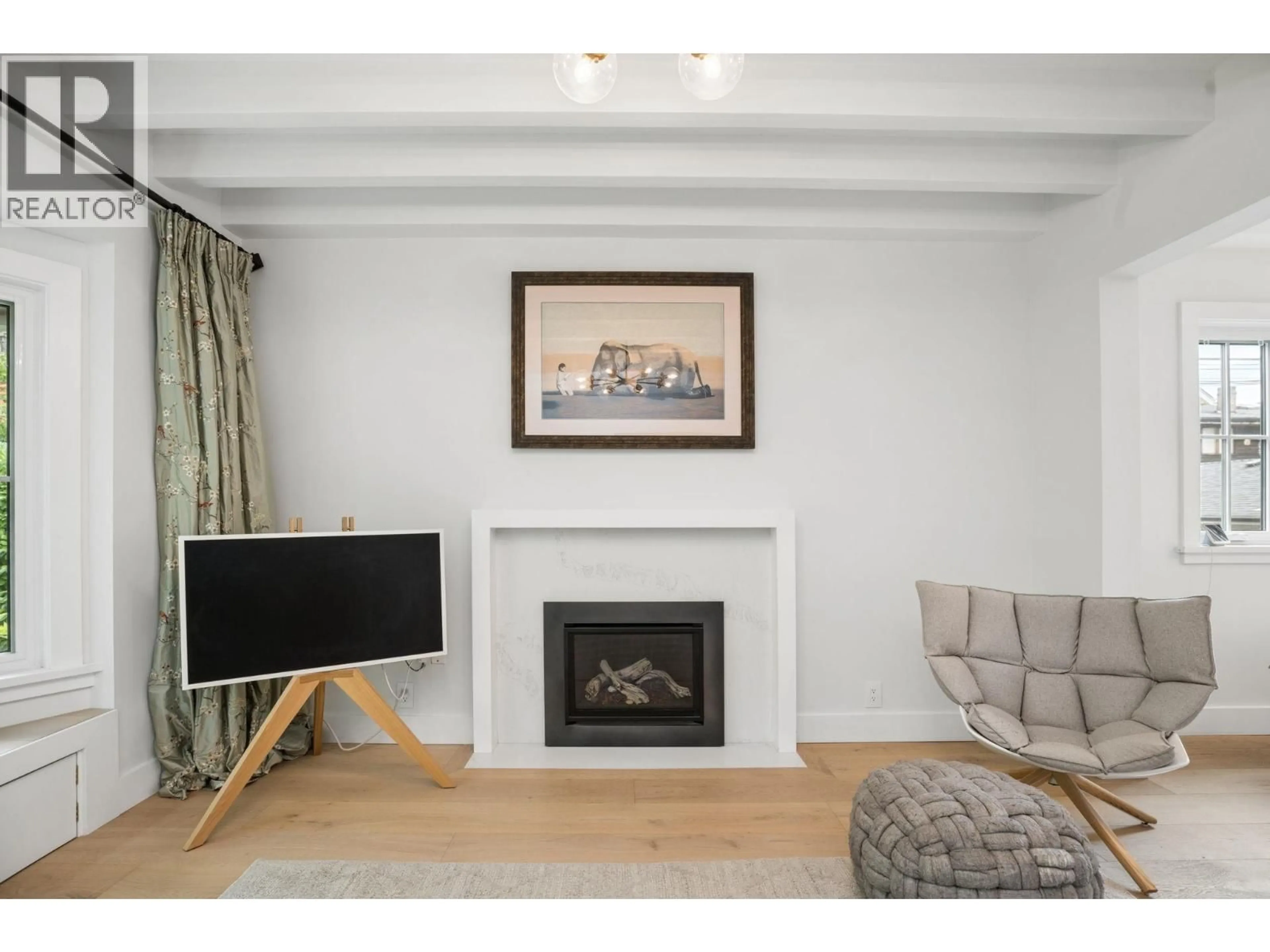 Living room with furniture, wood/laminate floor for 3426 11TH AVENUE, Vancouver British Columbia V6R2J9