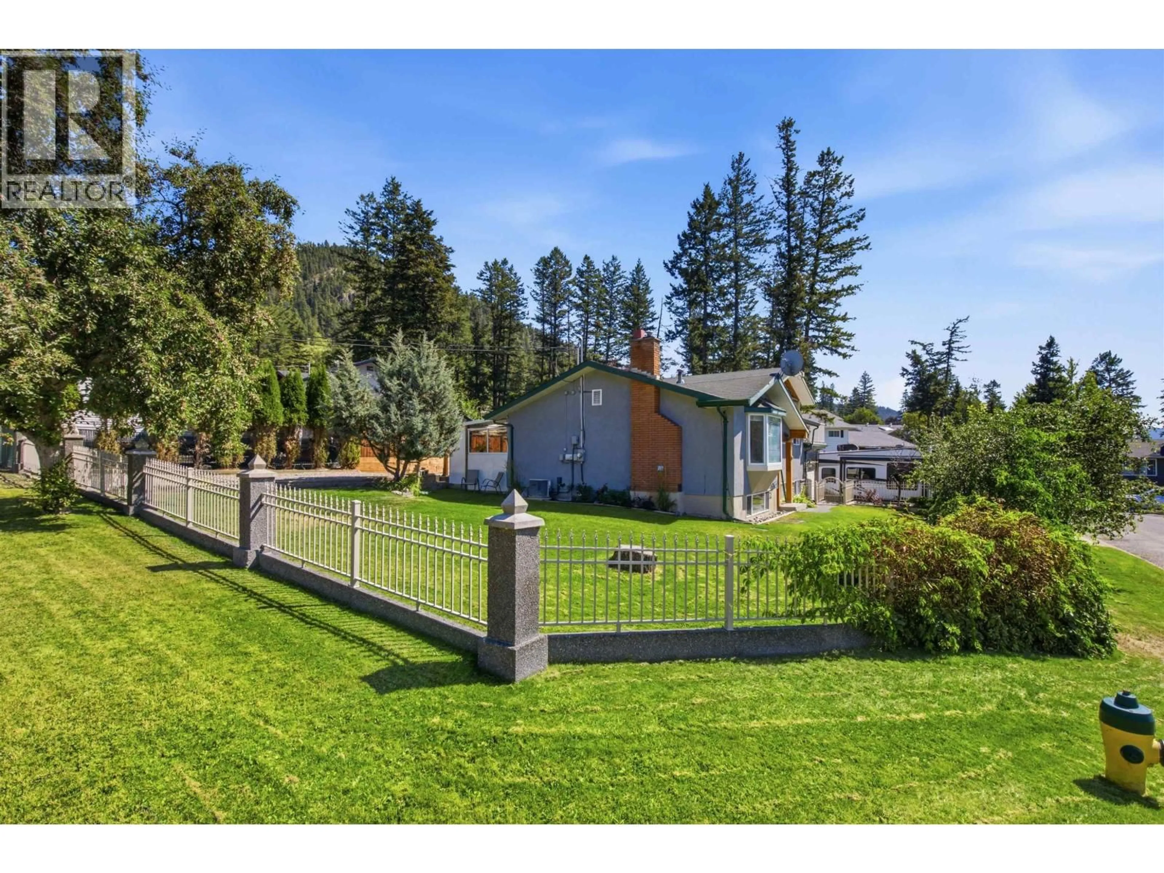 A pic from outside/outdoor area/front of a property/back of a property/a pic from drone, mountain view for 1140 AGNEW STREET, Williams Lake British Columbia V2G2N3