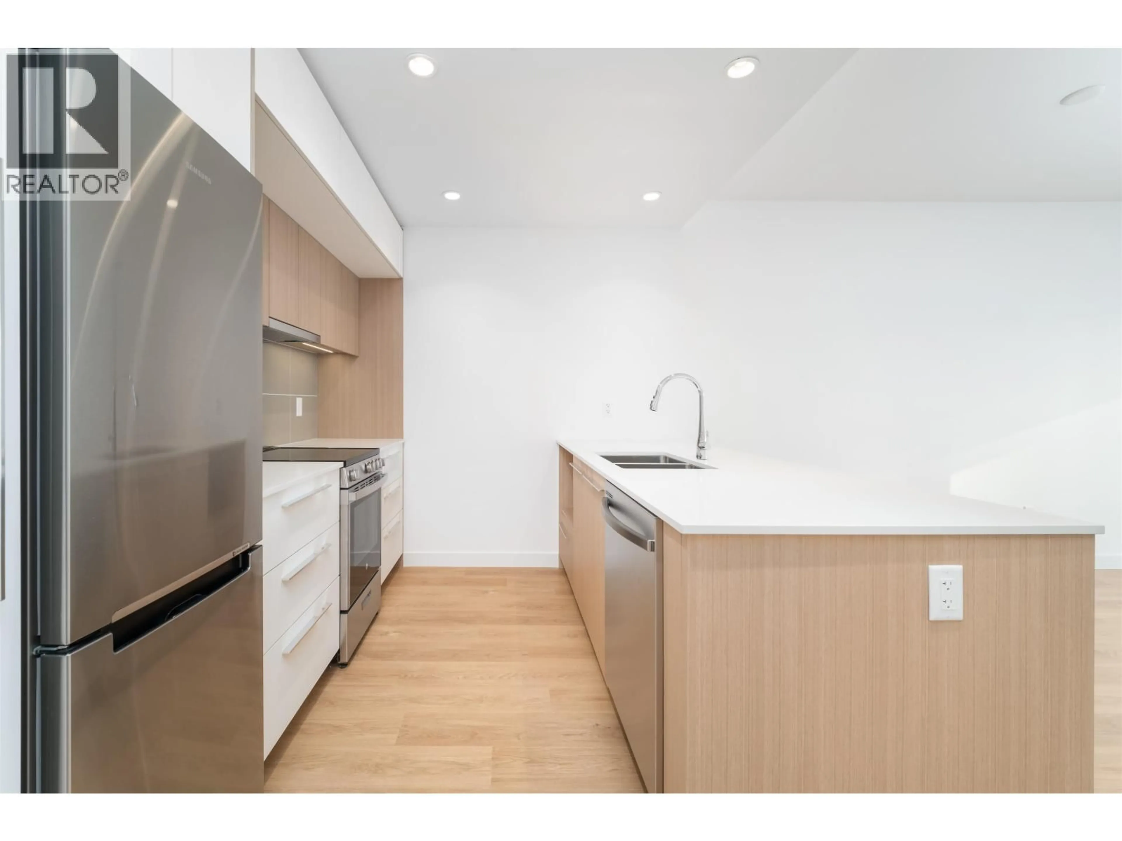 Standard kitchen, wood/laminate floor for 214 - 9888 UNIVERSITY CRESCENT, Burnaby British Columbia V5A0G4