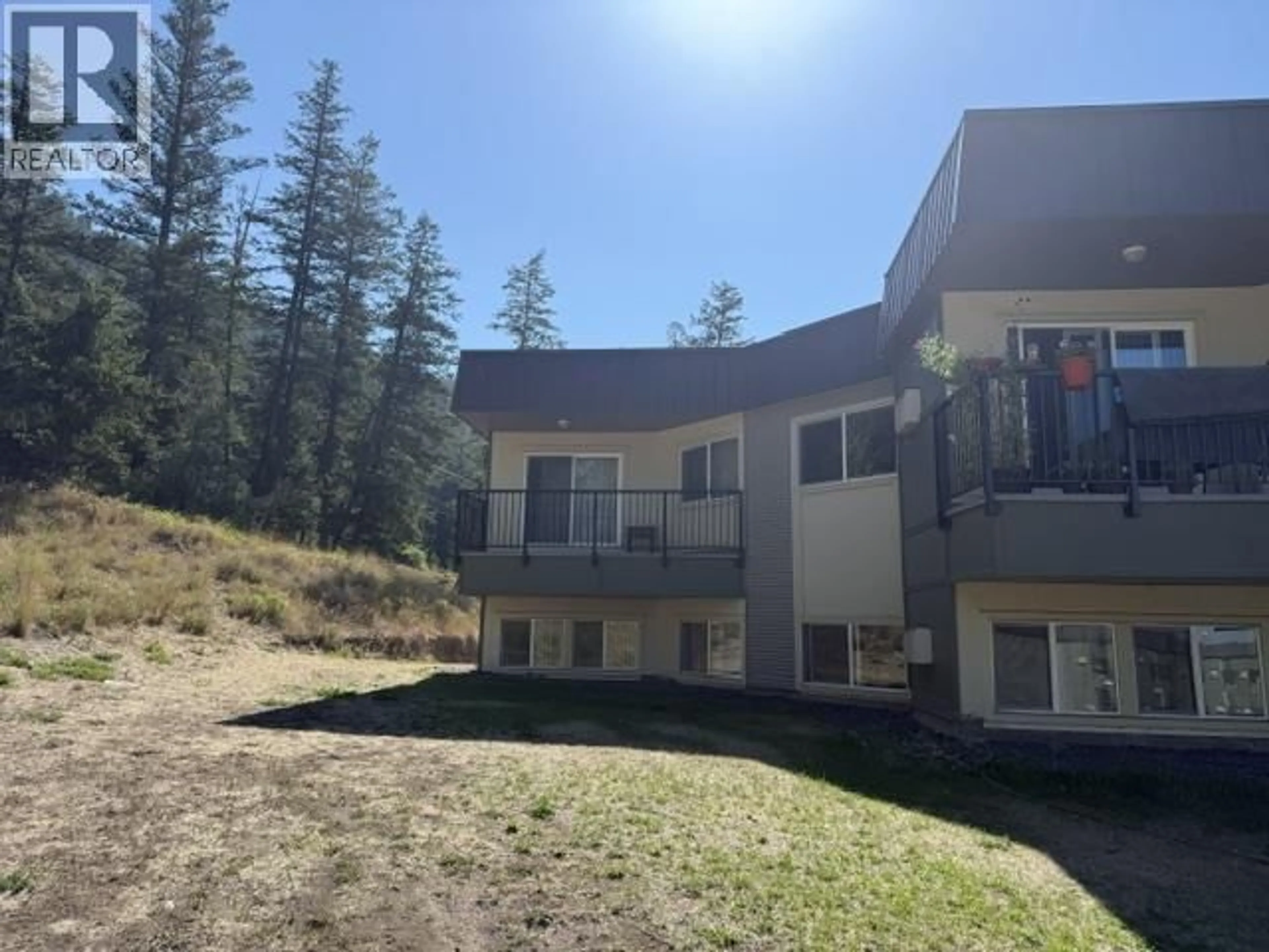 A pic from outside/outdoor area/front of a property/back of a property/a pic from drone, mountain view for 417 - 280 BROADWAY AVENUE, Williams Lake British Columbia V2G4J7