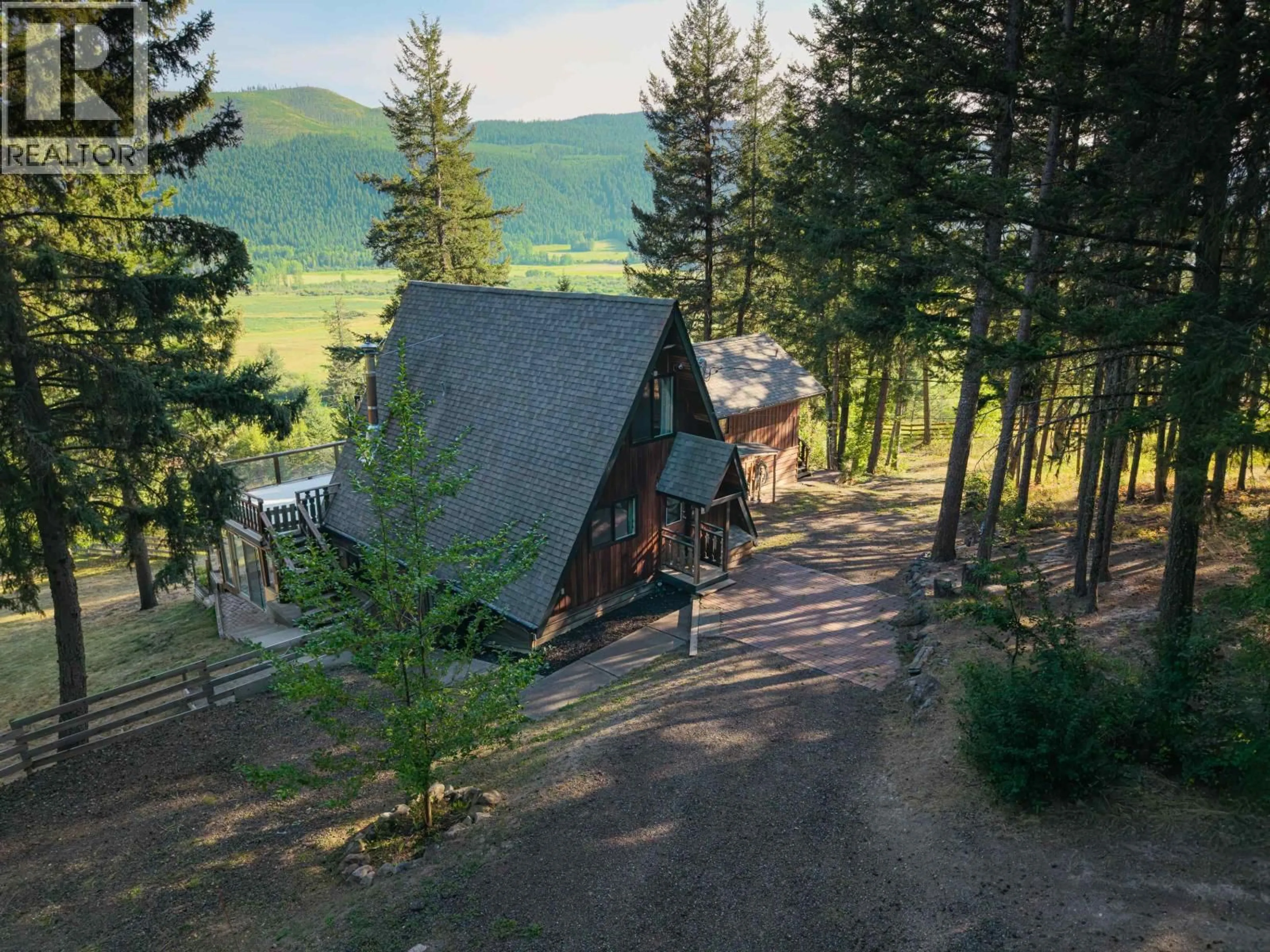 A pic from outside/outdoor area/front of a property/back of a property/a pic from drone, unknown for 7263 SUMMIT ROAD, Canim Lake British Columbia V0K1J0