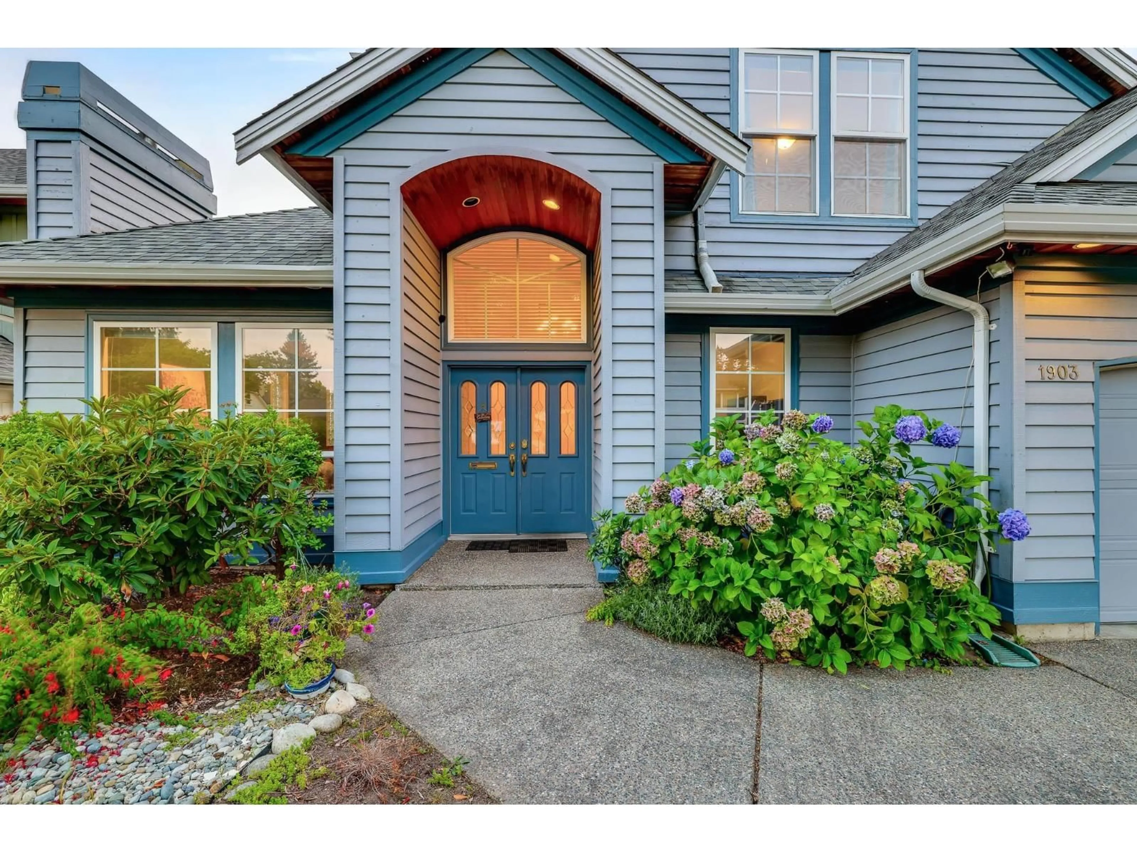 Home with vinyl exterior material, street for 1903 144TH STREET, Surrey British Columbia V4A7M6