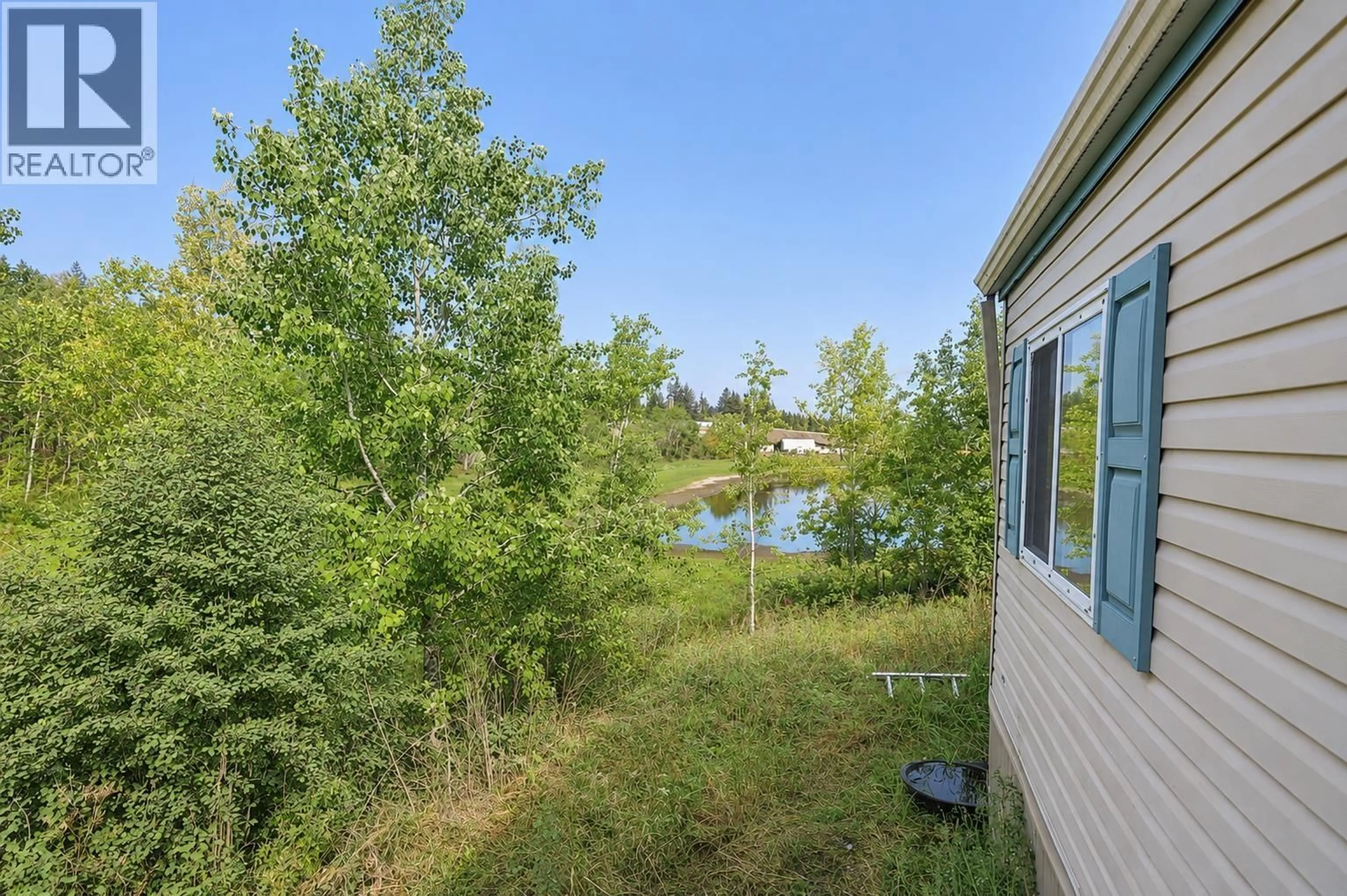 Patio, water/lake/river/ocean view for 5465 ELLIOT LAKE ROAD, 108 Mile Ranch British Columbia V0K2E1