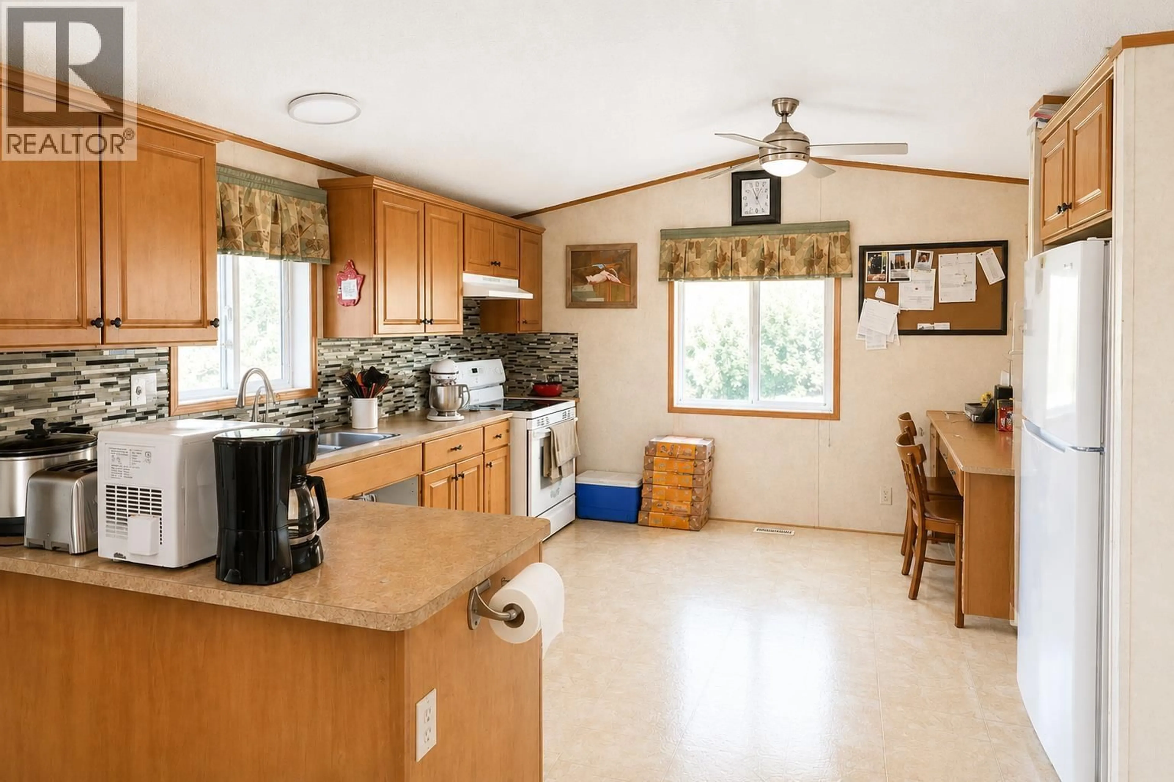 Standard kitchen, ceramic/tile floor for 5465 ELLIOT LAKE ROAD, 108 Mile Ranch British Columbia V0K2E1