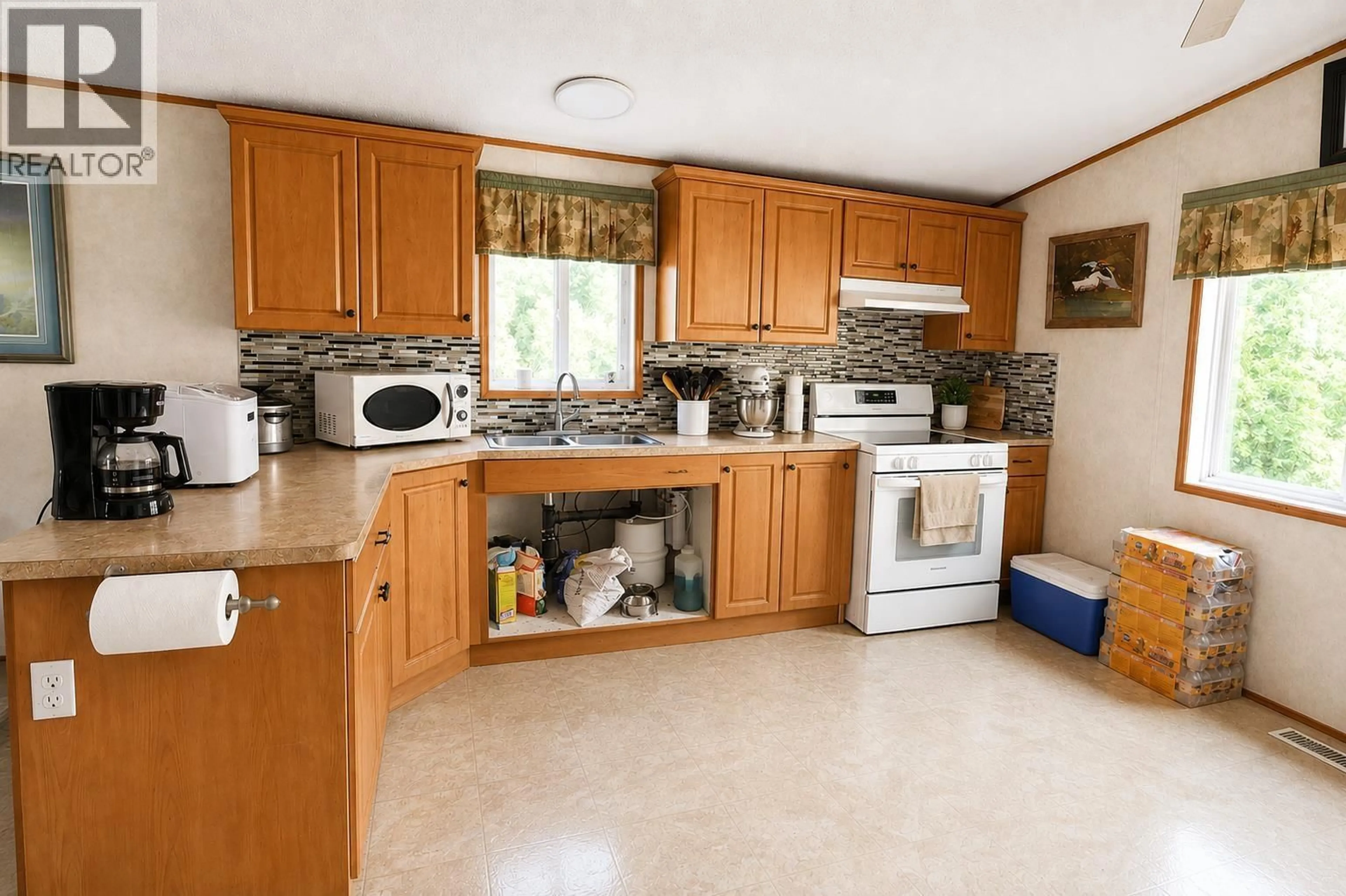 Standard kitchen, ceramic/tile floor for 5465 ELLIOT LAKE ROAD, 108 Mile Ranch British Columbia V0K2E1