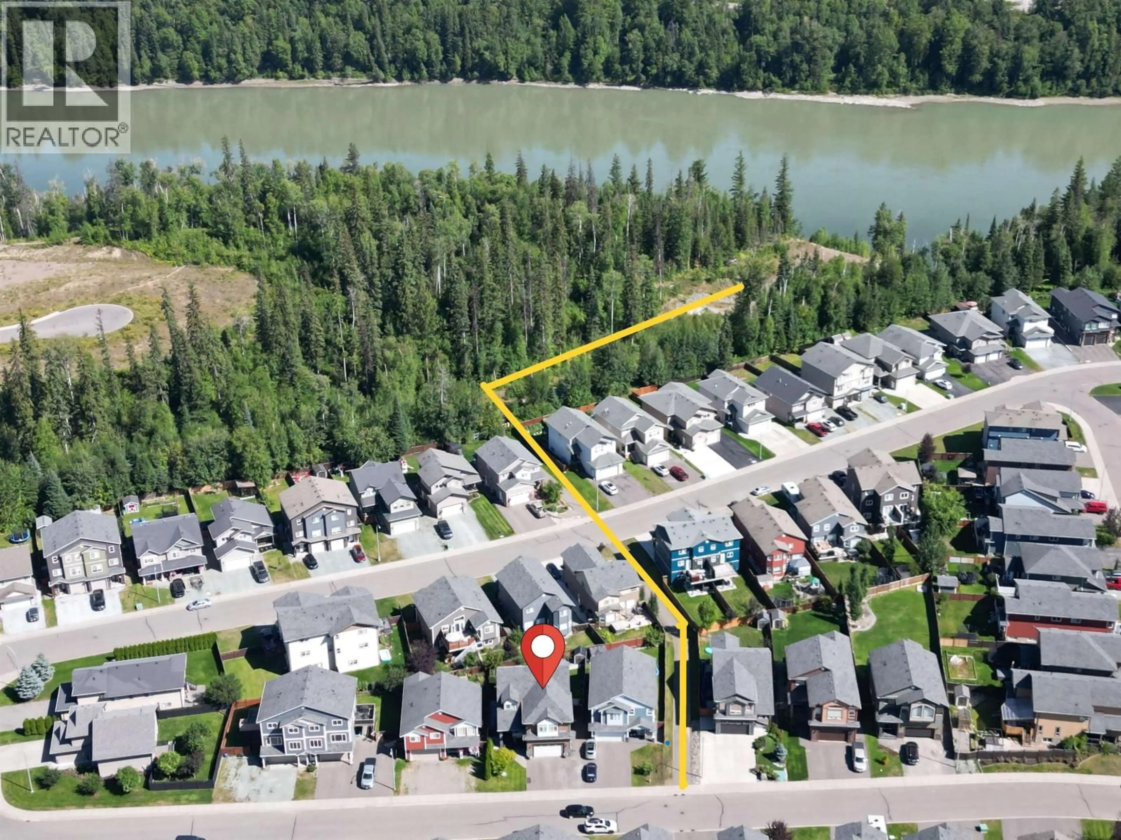 A pic from outside/outdoor area/front of a property/back of a property/a pic from drone, water/lake/river/ocean view for 7648 STILLWATER CRESCENT, Prince George British Columbia V2N0C2