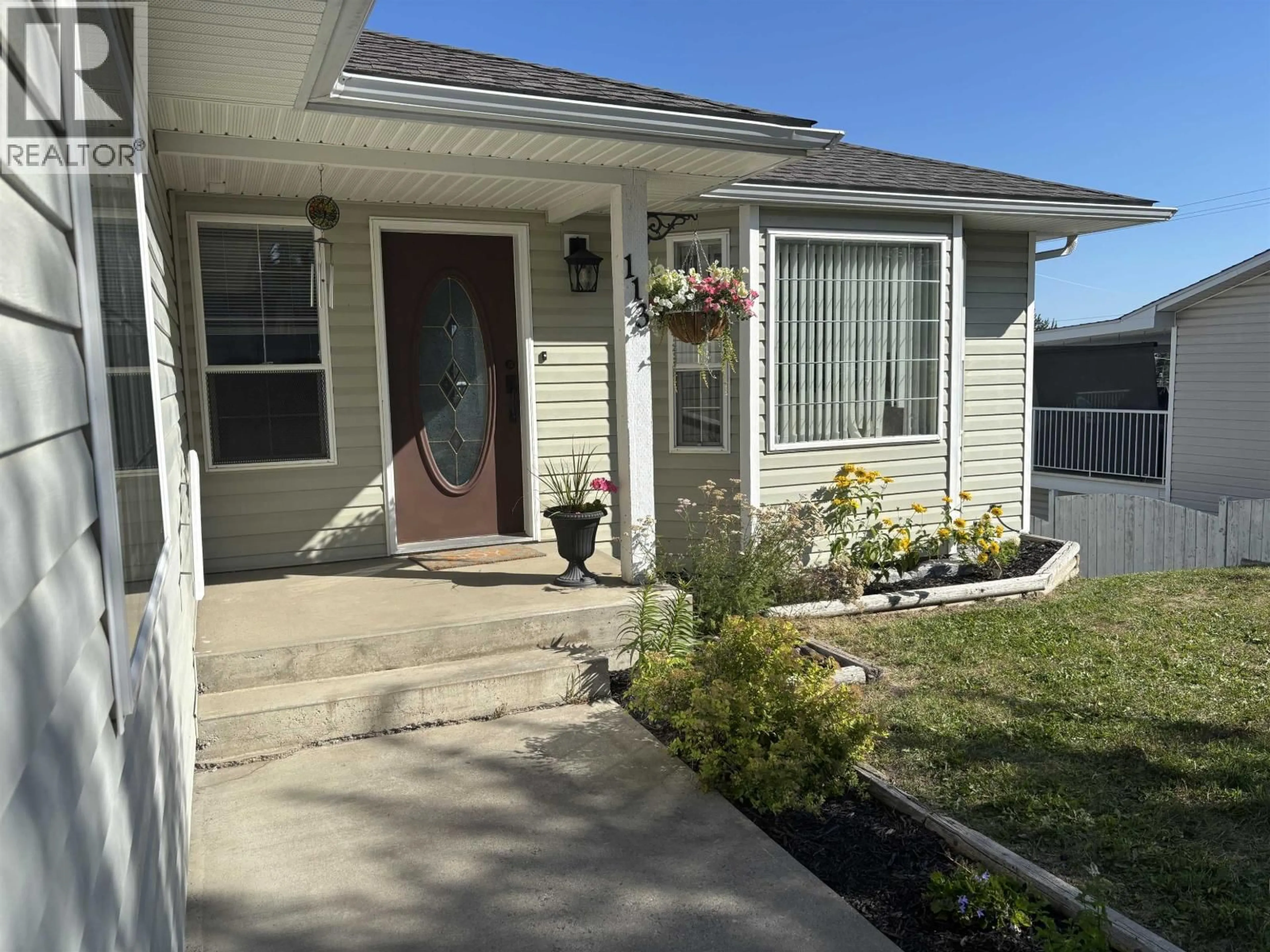 Home with vinyl exterior material, street for 113 FIFTH STREET, Vanderhoof British Columbia V0J3A0