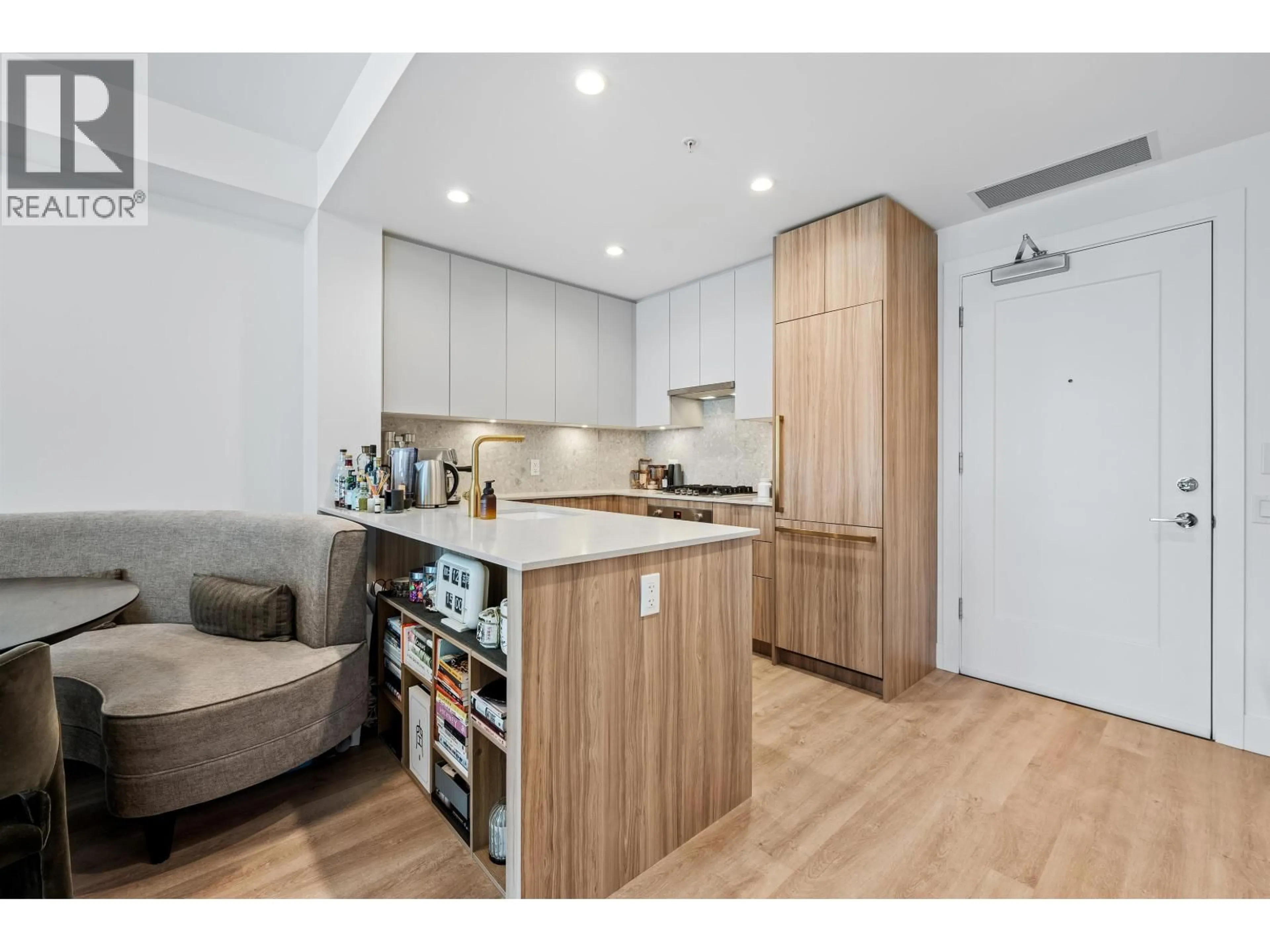 Open concept kitchen, wood/laminate floor for 505 - 2385 EMERY COURT, North Vancouver British Columbia V7J0G1