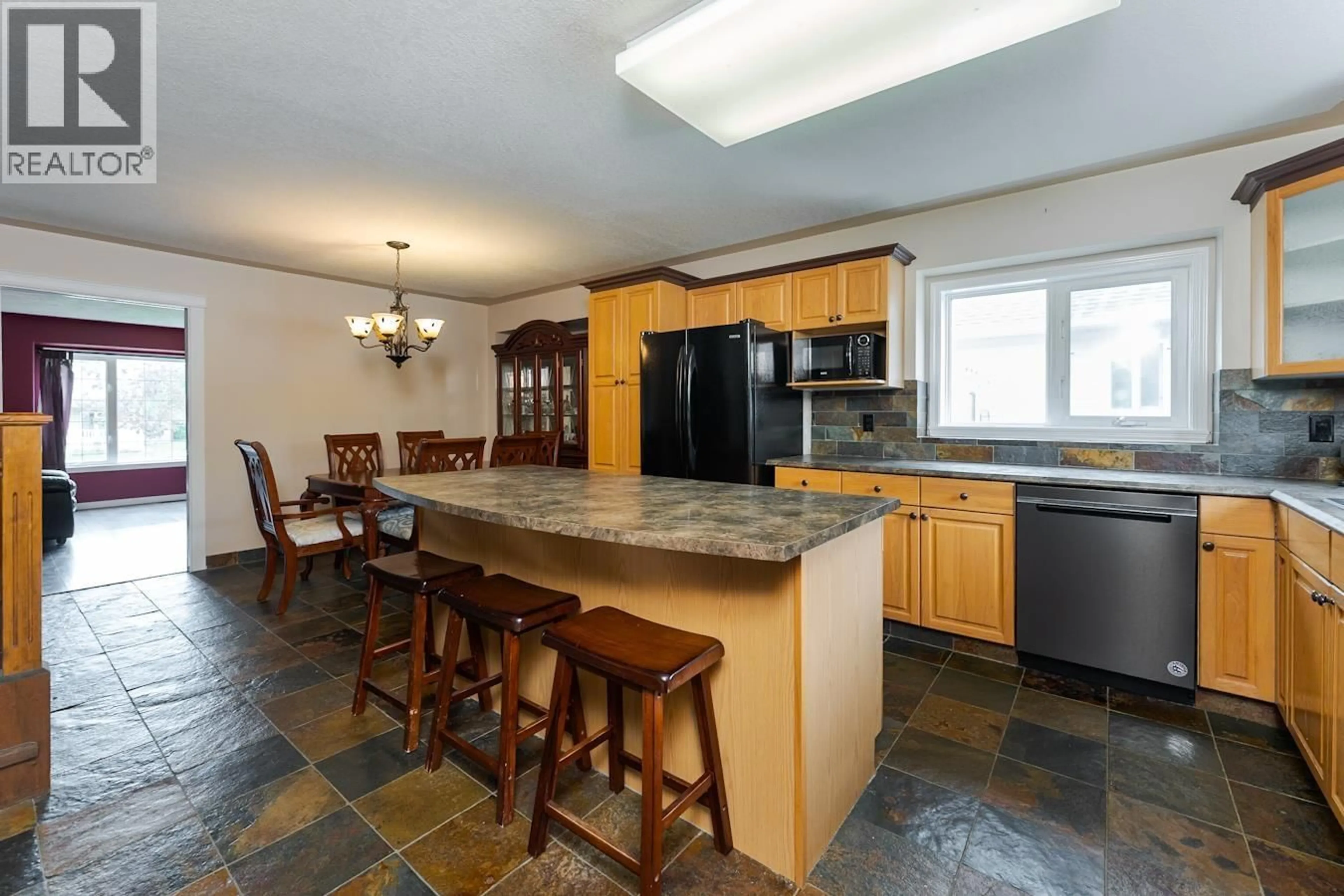 Open concept kitchen, ceramic/tile floor for 5559 HEYER ROAD, Prince George British Columbia V2N6J3