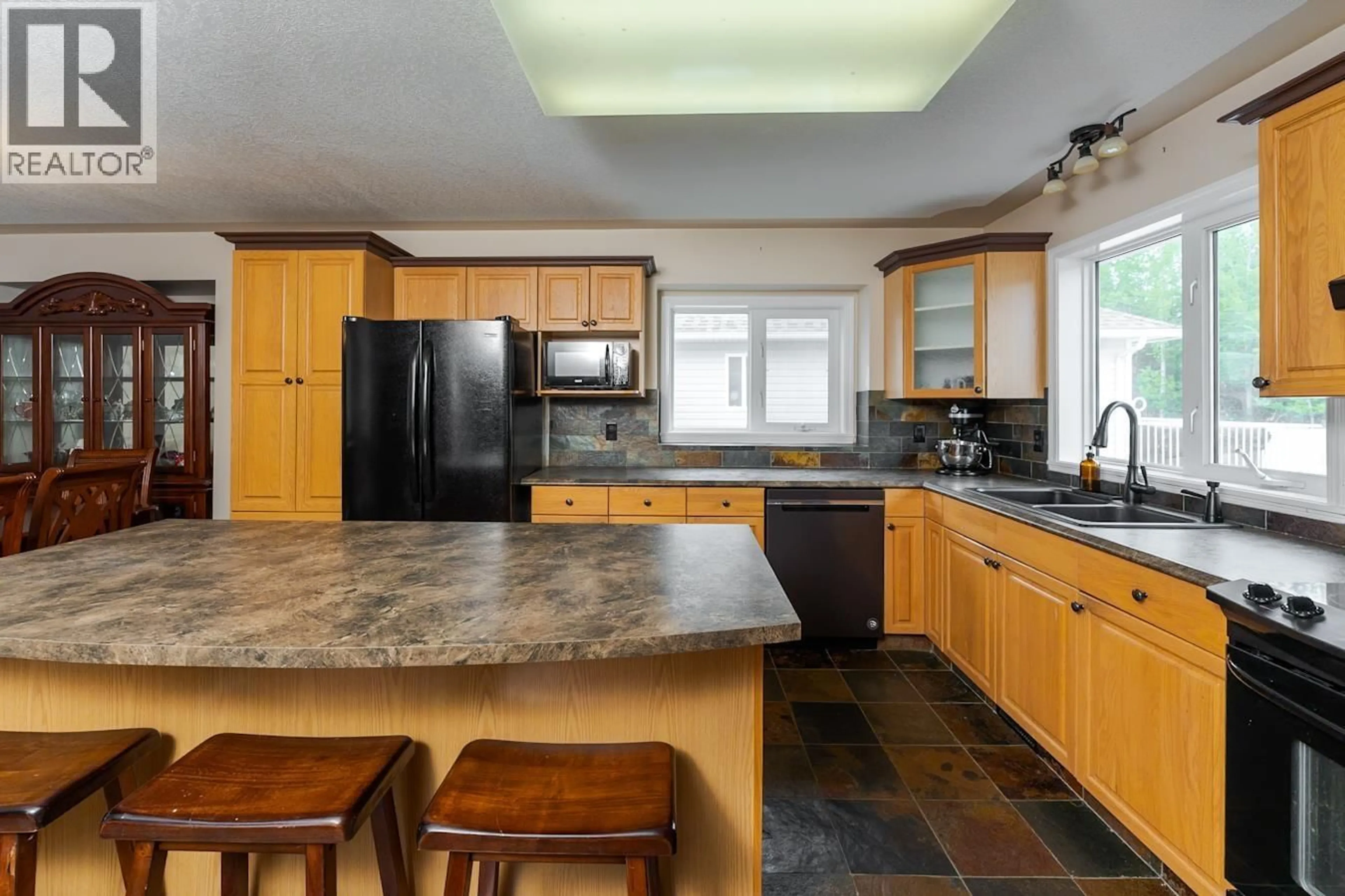 Open concept kitchen, ceramic/tile floor for 5559 HEYER ROAD, Prince George British Columbia V2N6J3