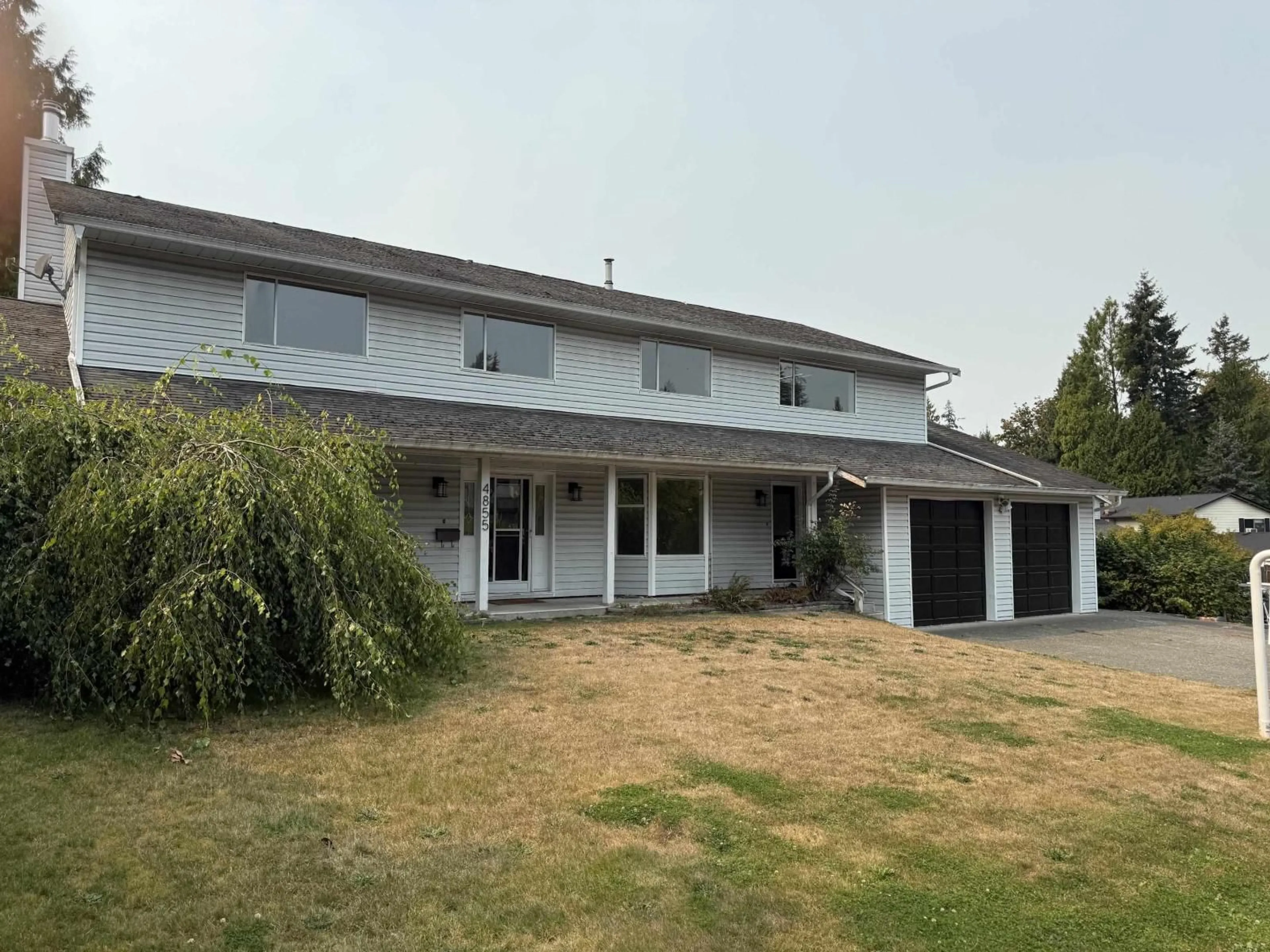 A pic from outside/outdoor area/front of a property/back of a property/a pic from drone, unknown for 4855 200A STREET, Langley British Columbia V3A5W7
