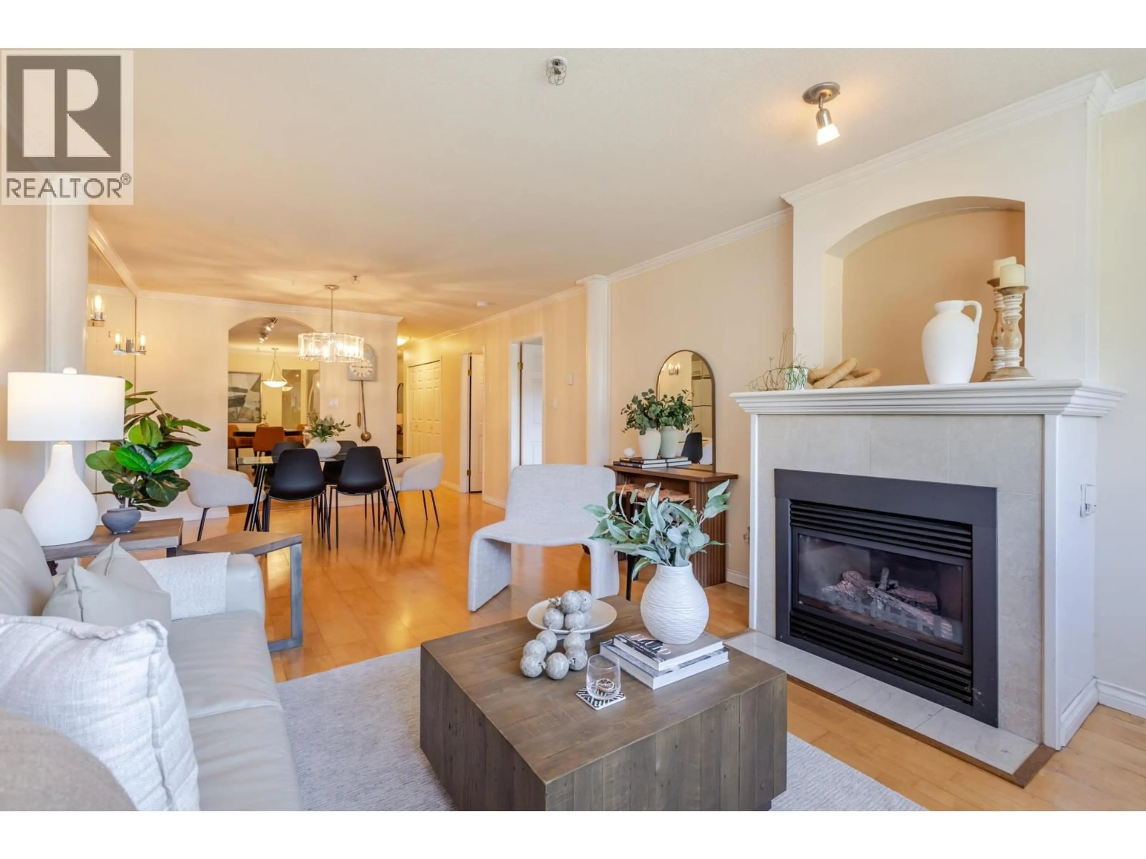 Living room with furniture, wood/laminate floor for 103 - 2 RENAISSANCE SQUARE, New Westminster British Columbia V3M6K3