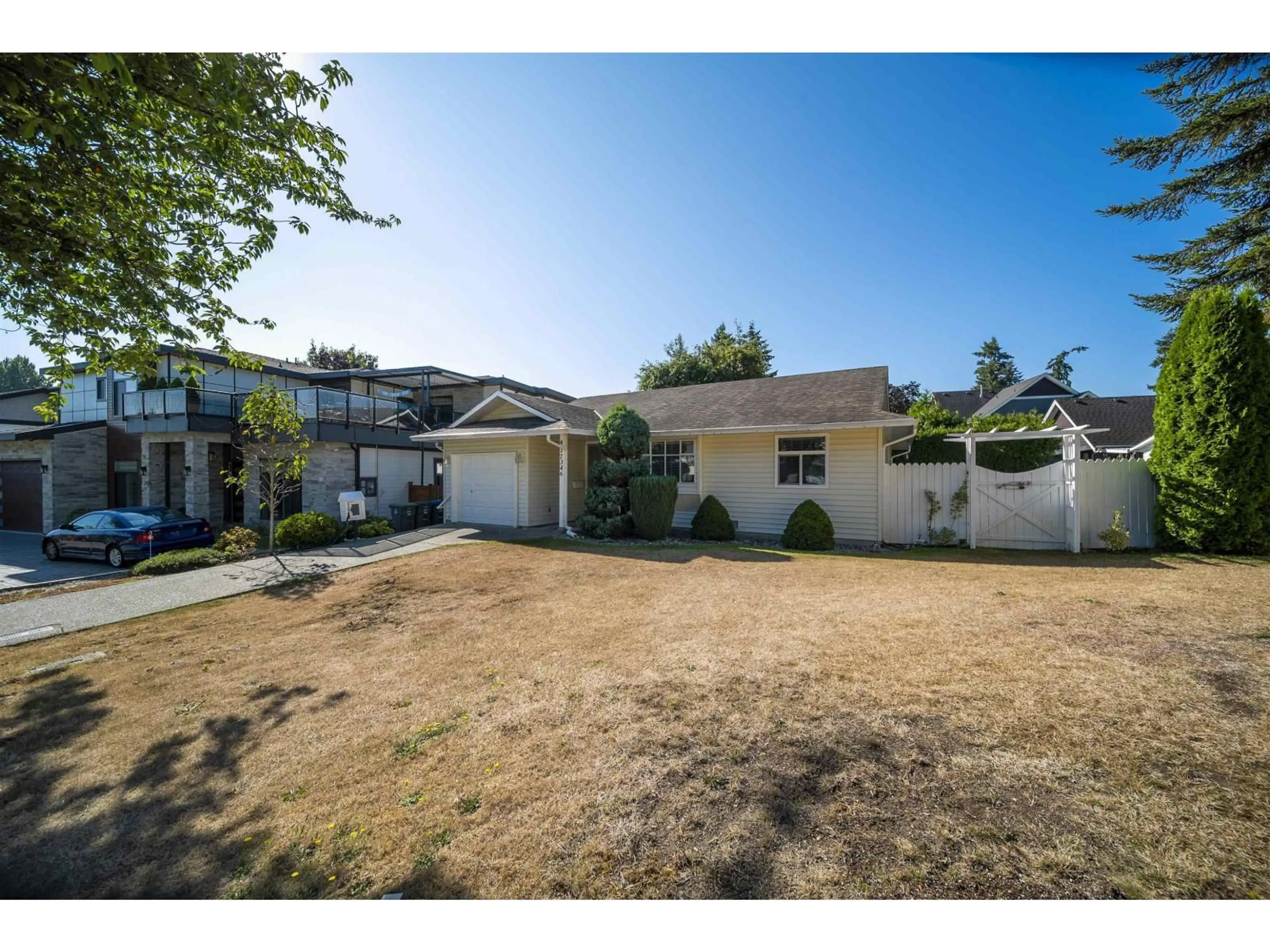 A pic from outside/outdoor area/front of a property/back of a property/a pic from drone, street for 17346 60A AVENUE, Surrey British Columbia V3S6X8