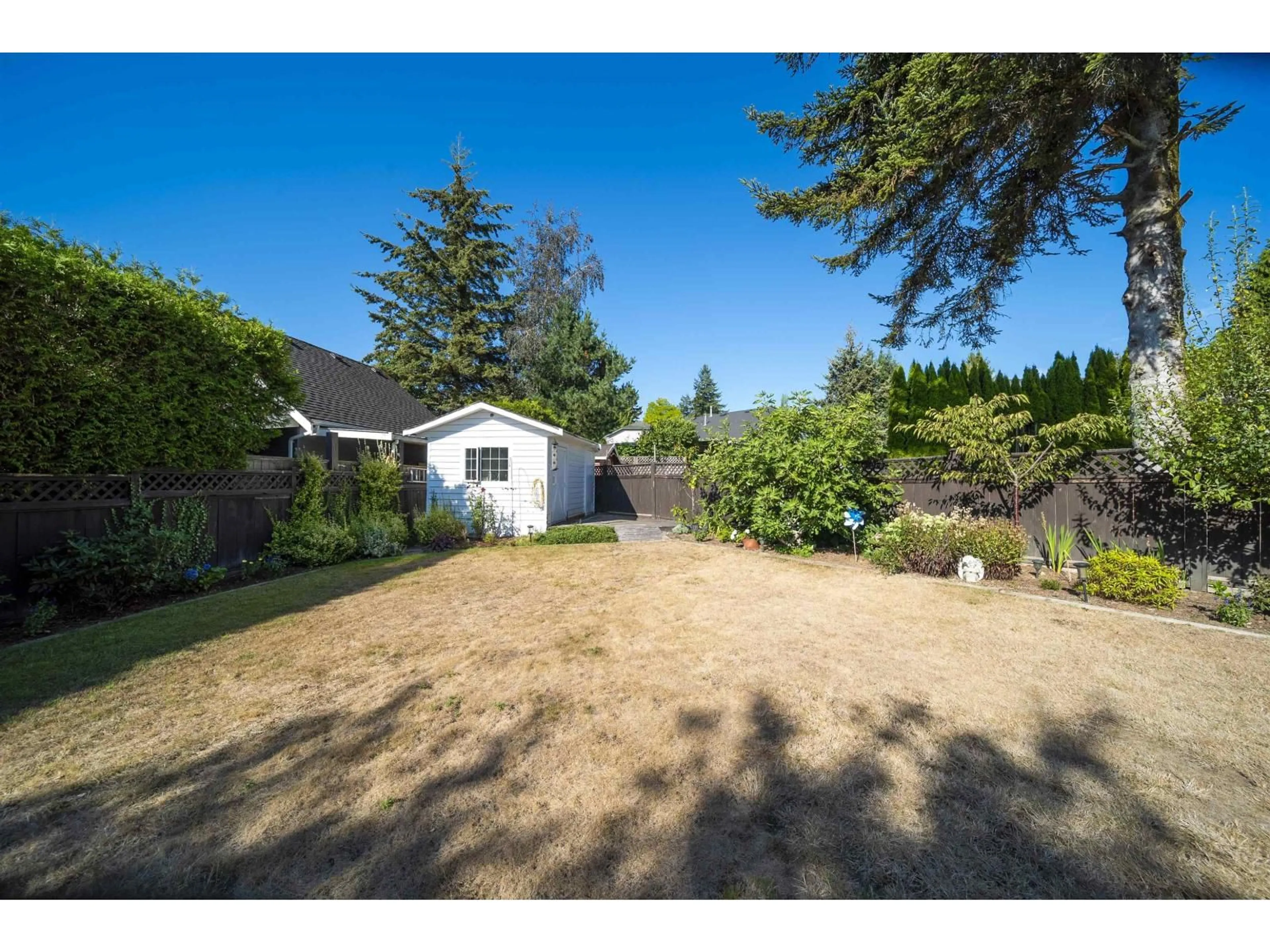 A pic from outside/outdoor area/front of a property/back of a property/a pic from drone, street for 17346 60A AVENUE, Surrey British Columbia V3S6X8