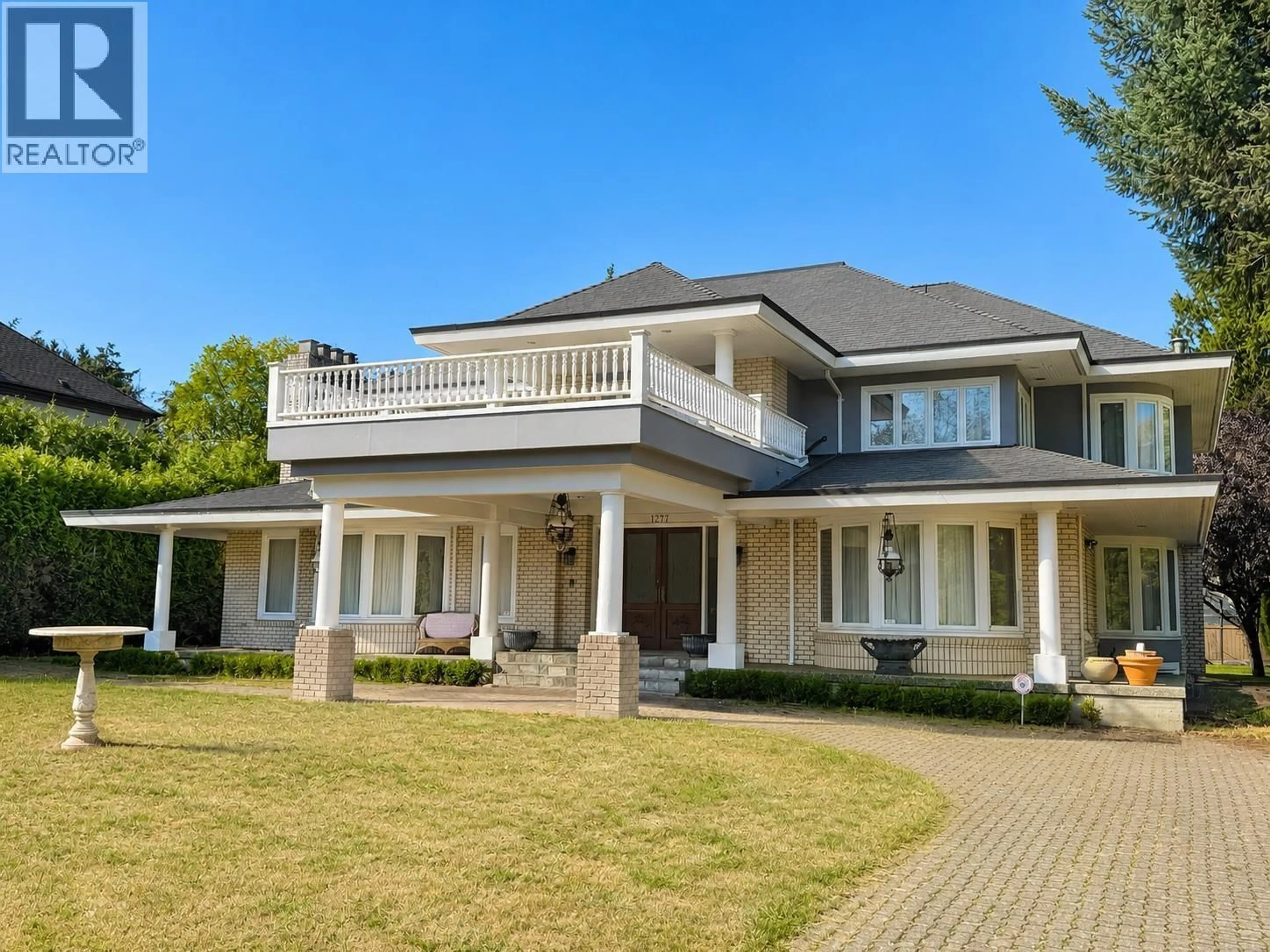 Home with vinyl exterior material, street for 1277 KING EDWARD AVENUE, Vancouver British Columbia V6H1Z8