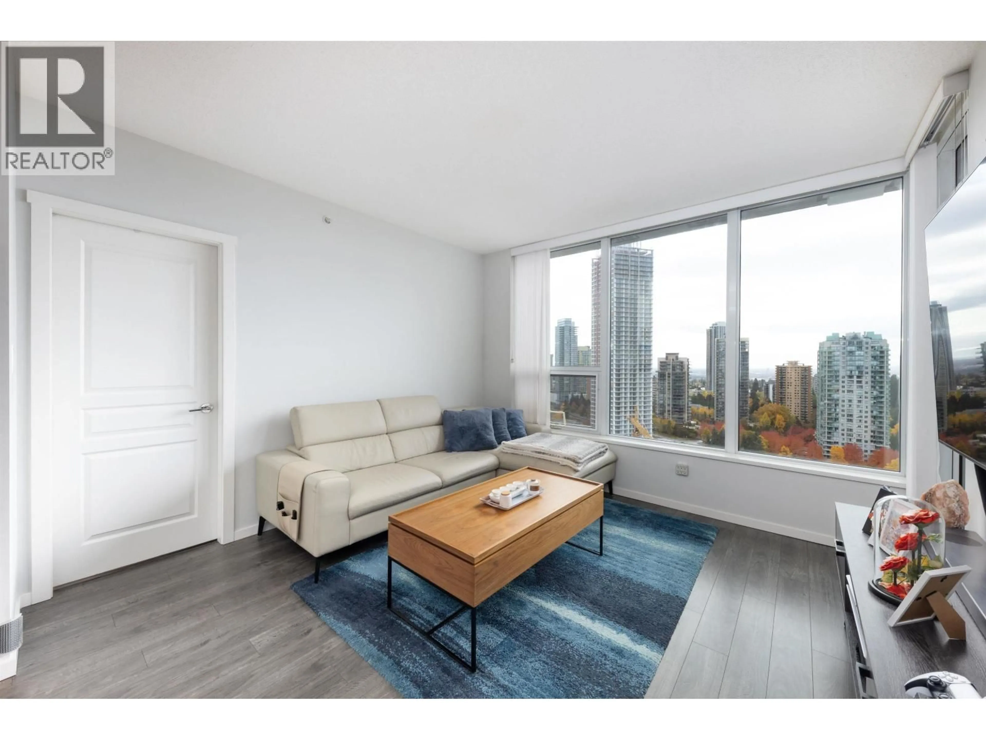Living room with furniture, wood/laminate floor for 2805 - 5883 BARKER AVENUE, Burnaby British Columbia V5H0G4