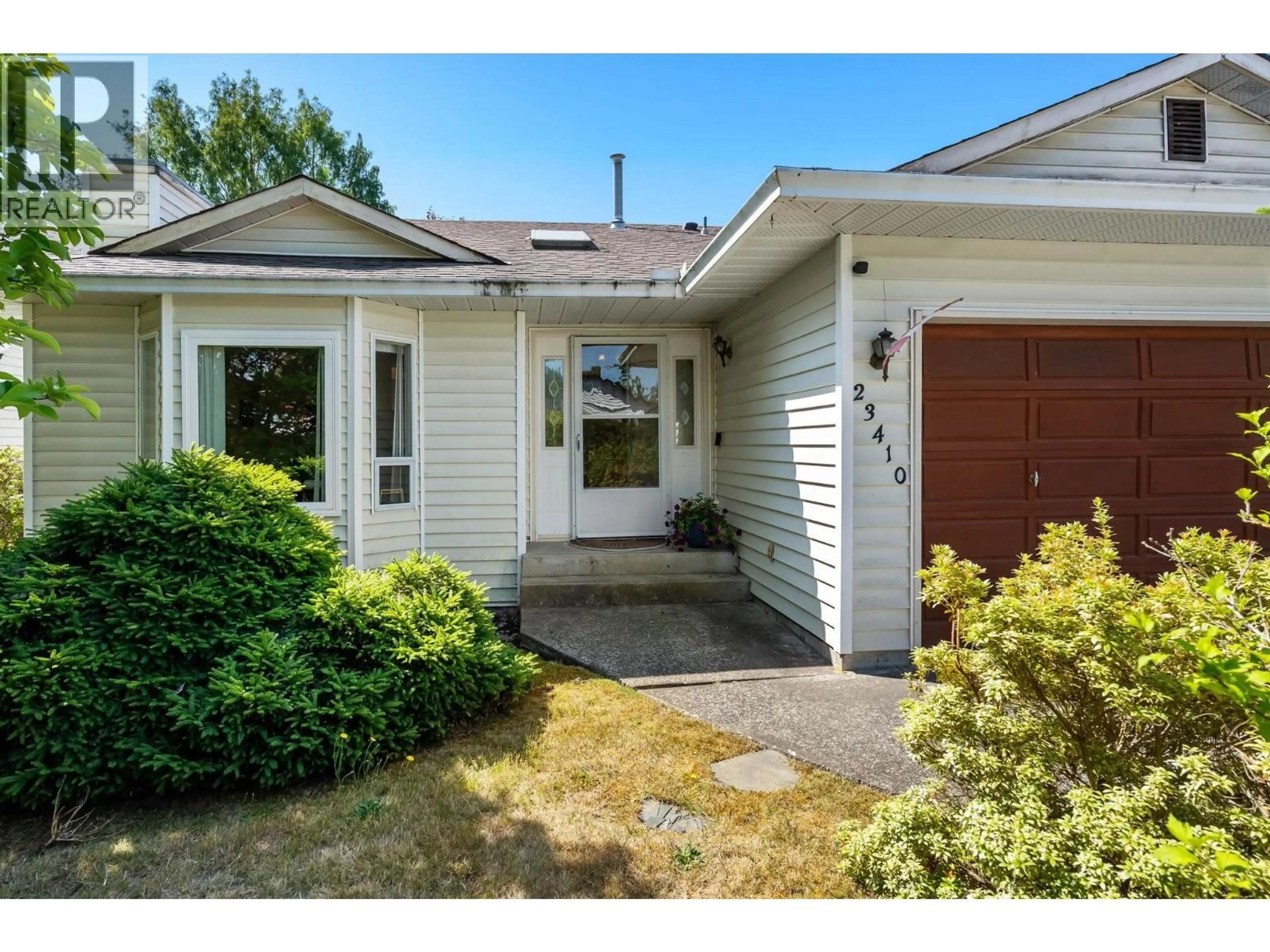 Home with vinyl exterior material, street for 23410 NIGHTINGALE AVENUE, Maple Ridge British Columbia V2X9C8