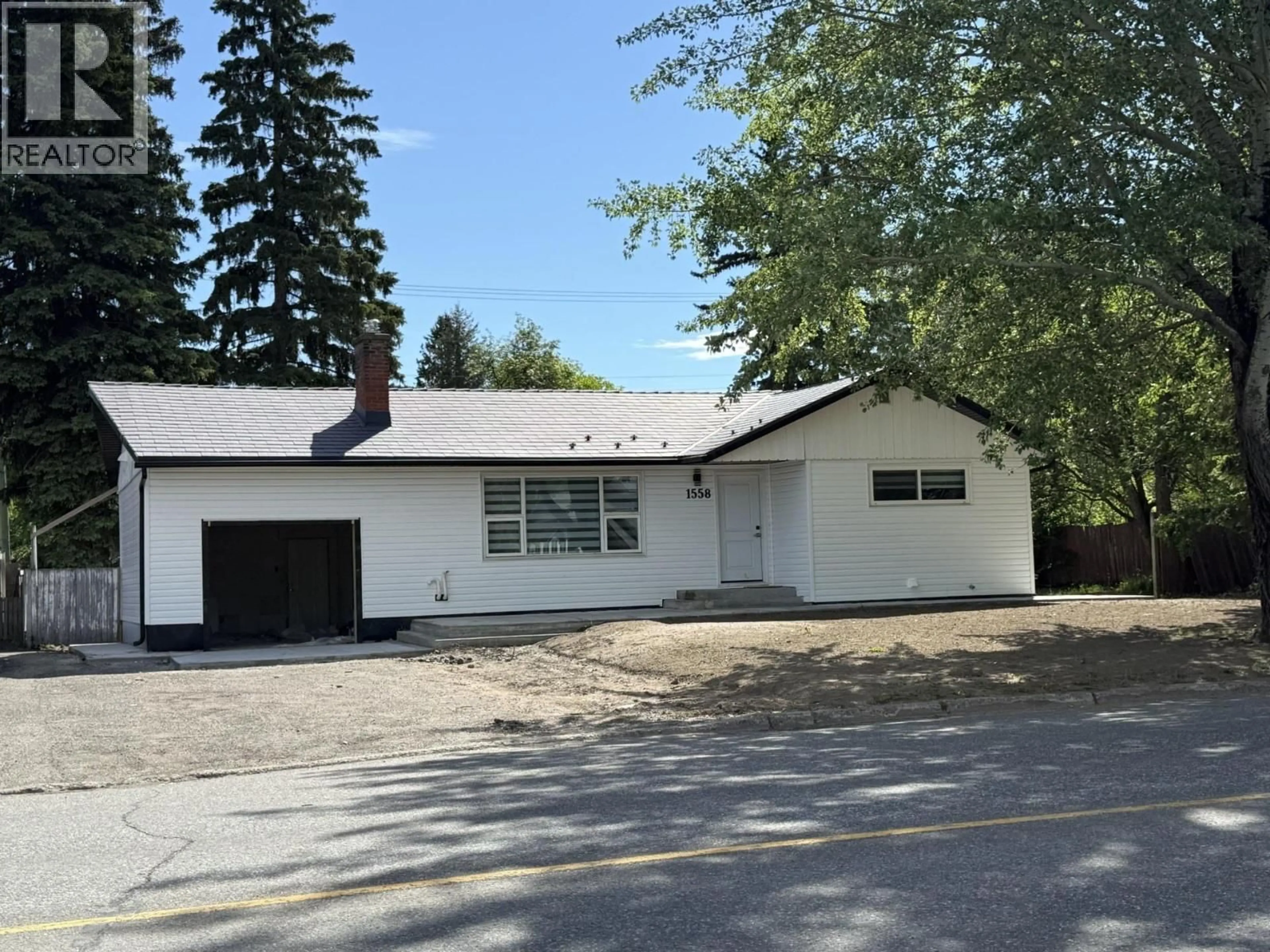 Home with vinyl exterior material, street for 1558 CARNEY STREET, Prince George British Columbia V2M2L5