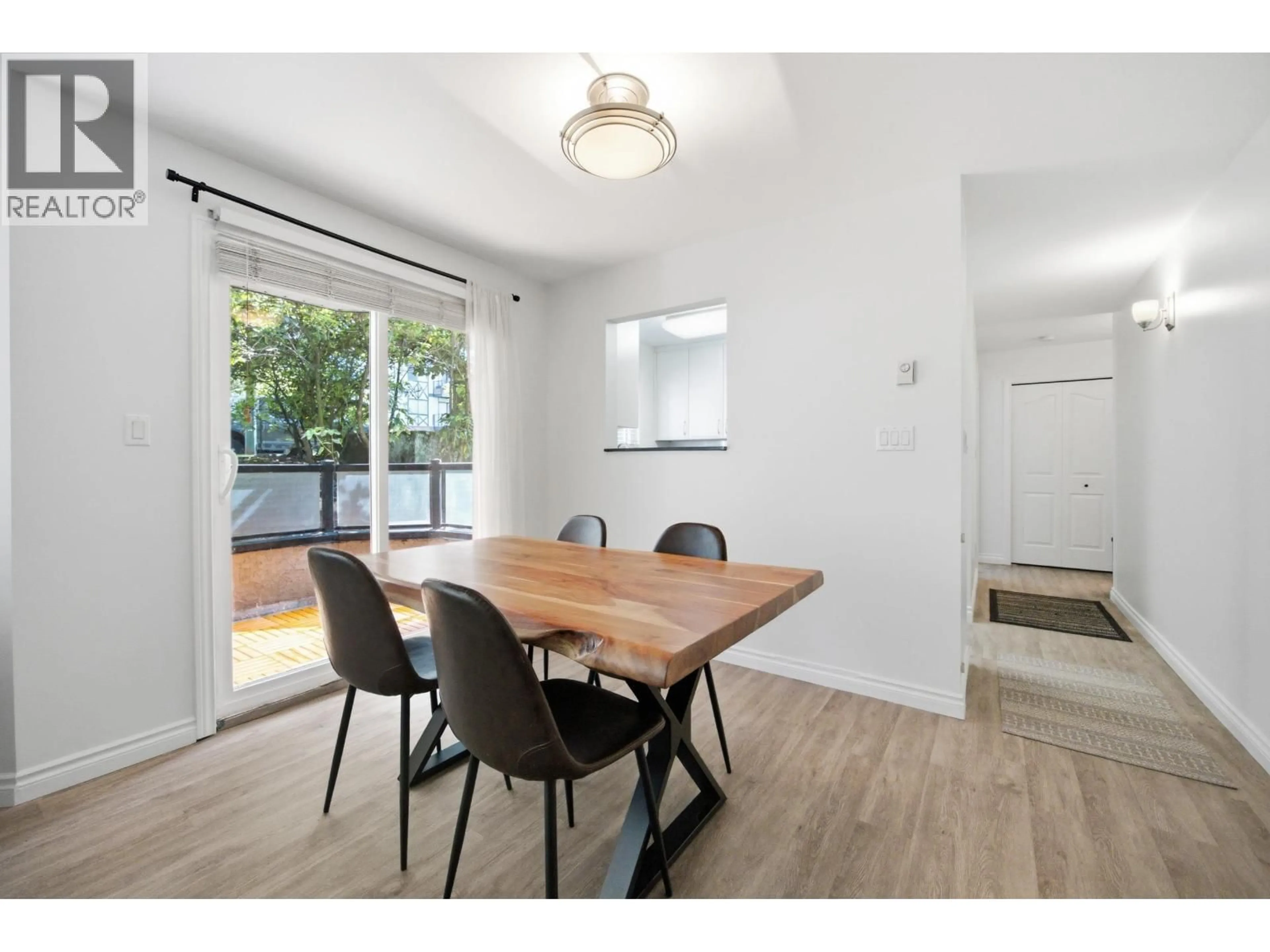 Dining room, wood/laminate floor for 101 - 175 4TH STREET, North Vancouver British Columbia V7M1H6