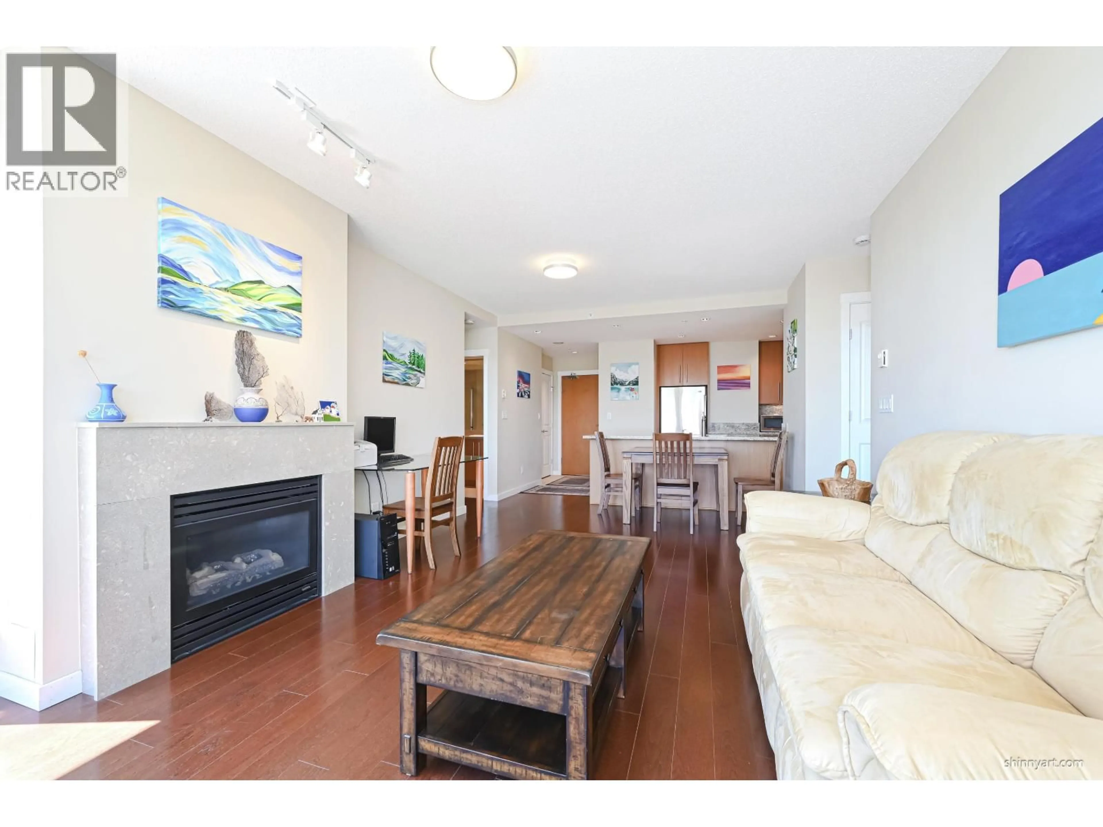 Living room with furniture, wood/laminate floor for 803 - 2688 MALL, Vancouver British Columbia V6T2J8