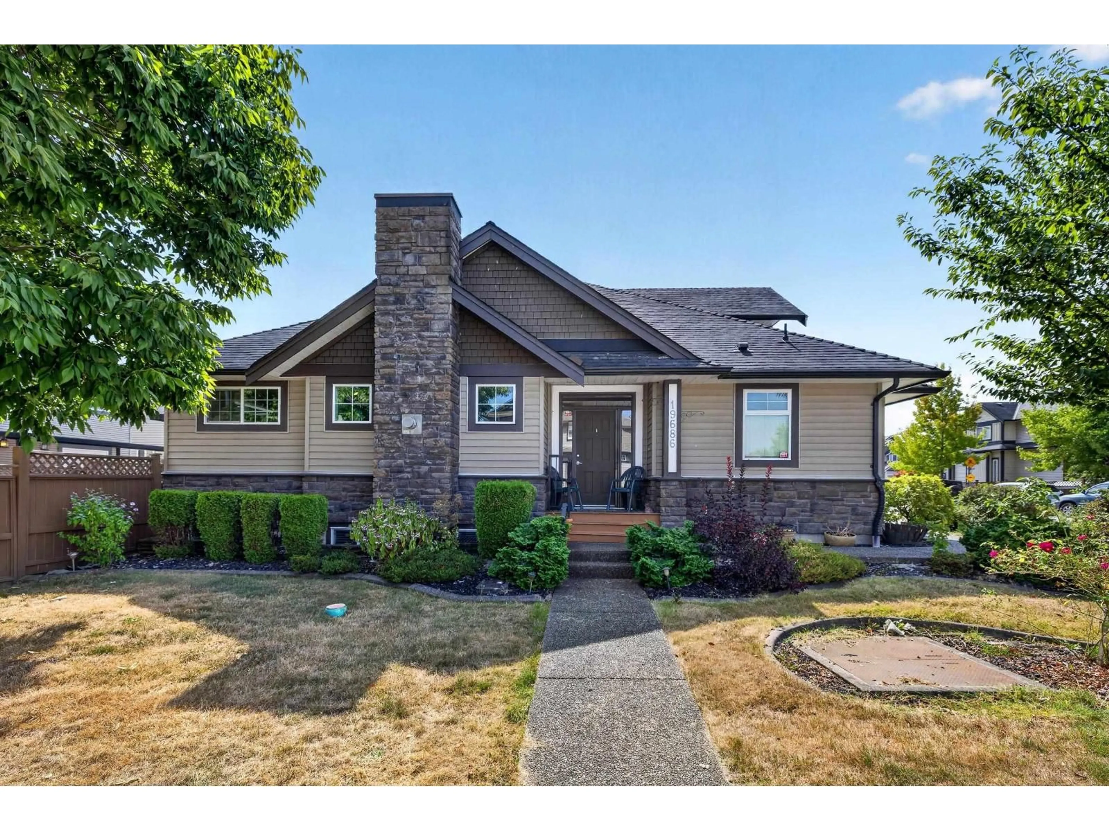 Home with vinyl exterior material, street for 19686 73A AVENUE, Langley British Columbia V2Y3C4