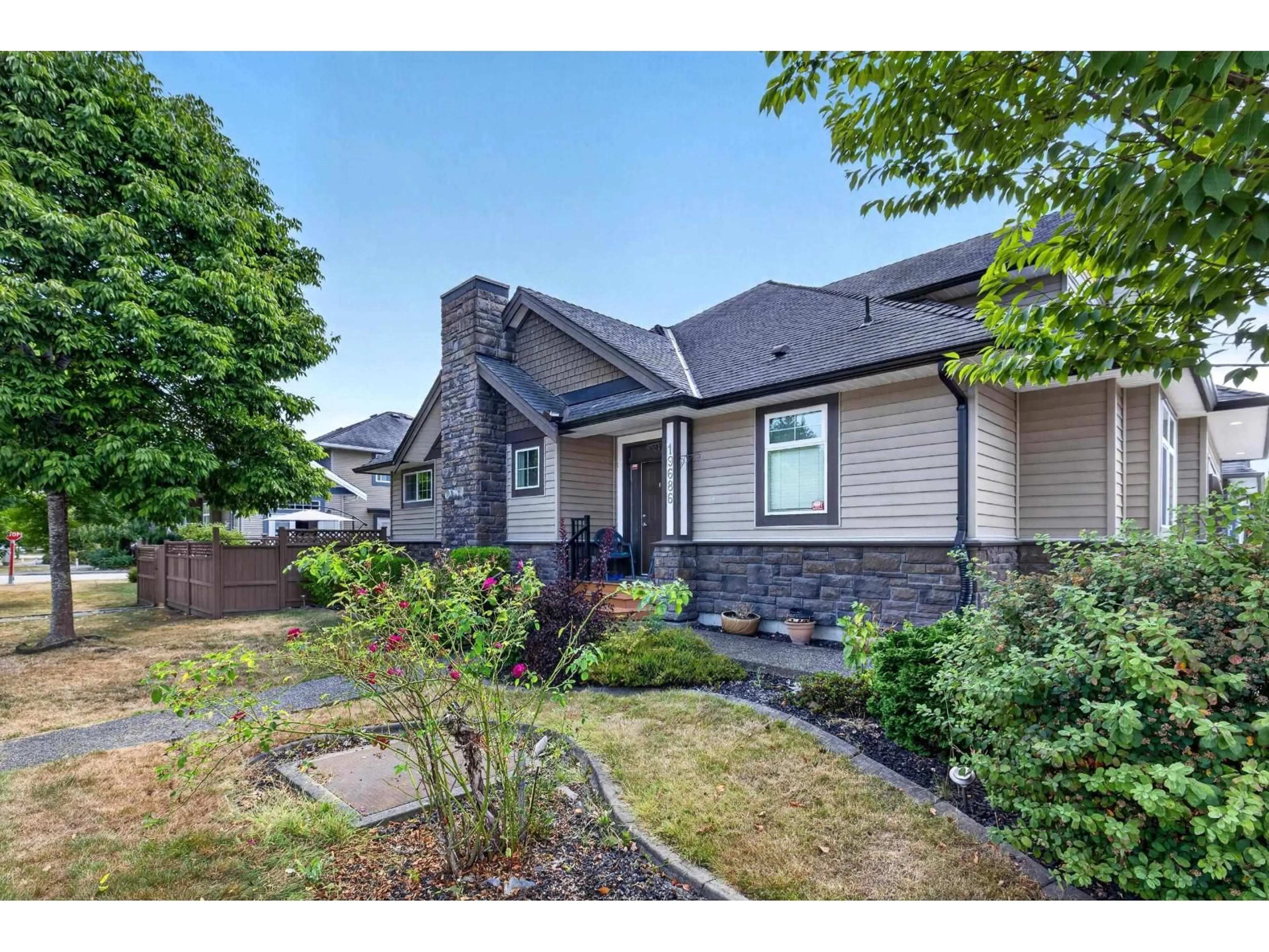 Home with vinyl exterior material, street for 19686 73A AVENUE, Langley British Columbia V2Y3C4