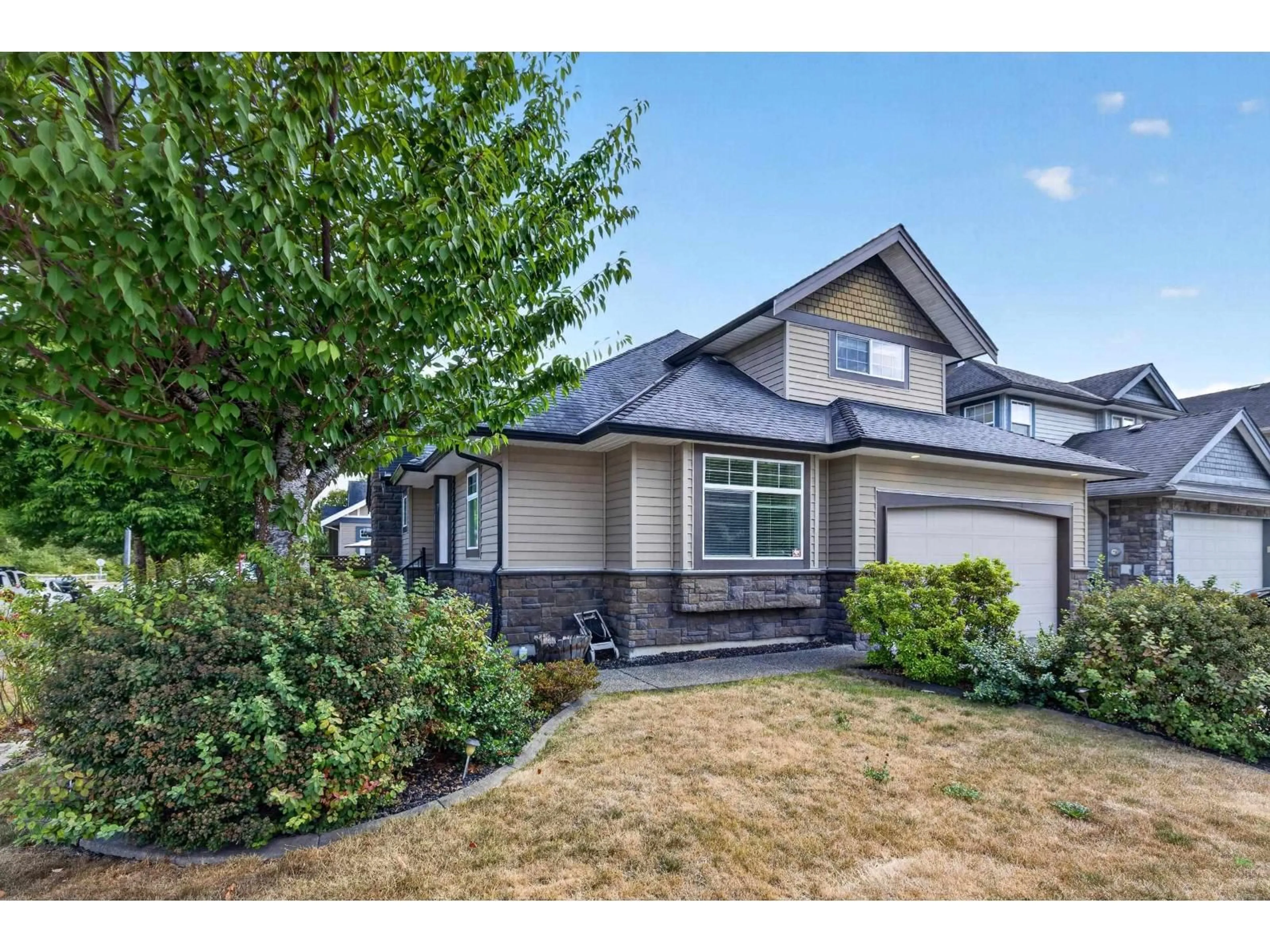 Home with vinyl exterior material, street for 19686 73A AVENUE, Langley British Columbia V2Y3C4