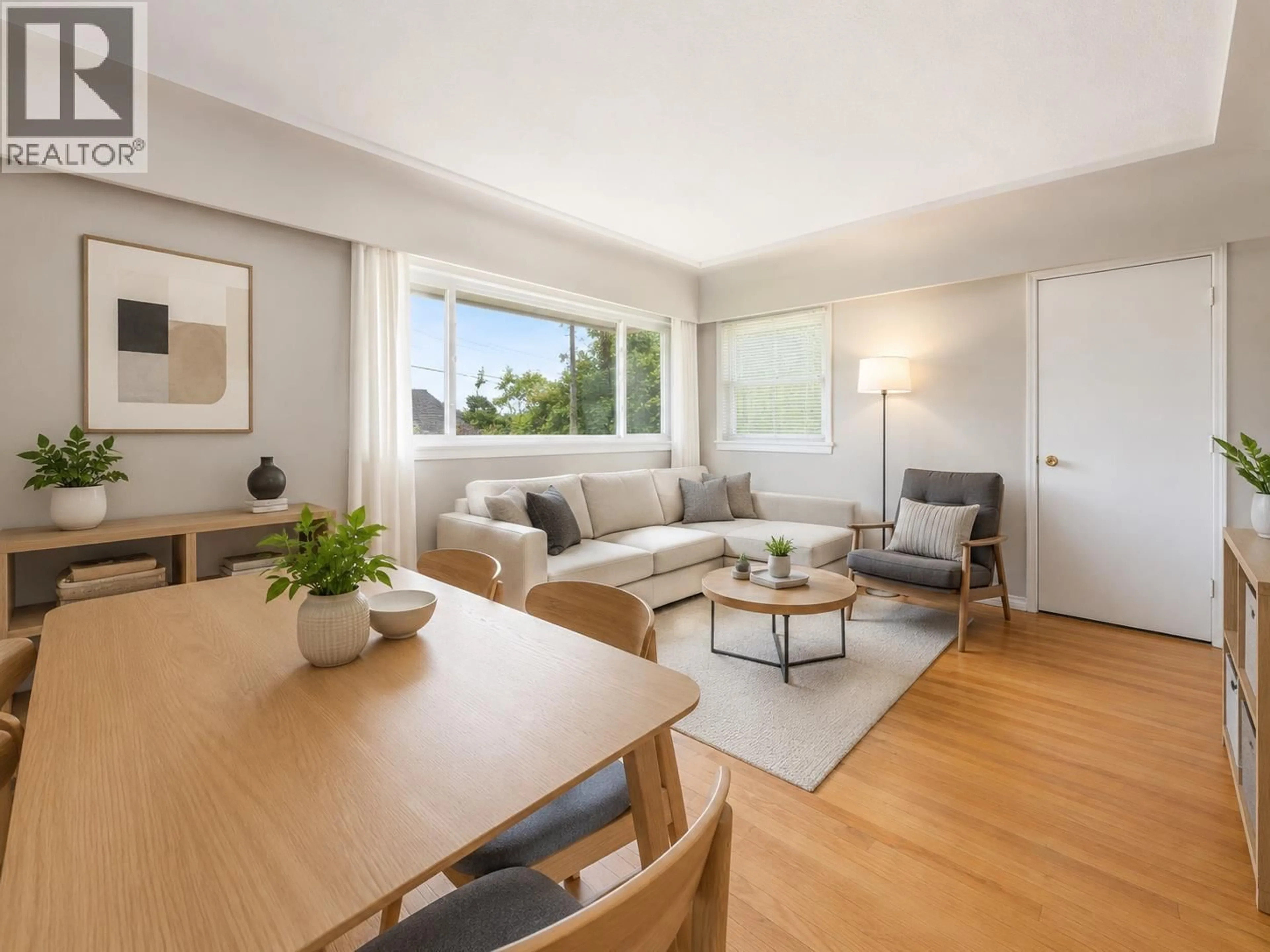Living room with furniture, wood/laminate floor for 4561 NANAIMO STREET, Vancouver British Columbia V5N5J5